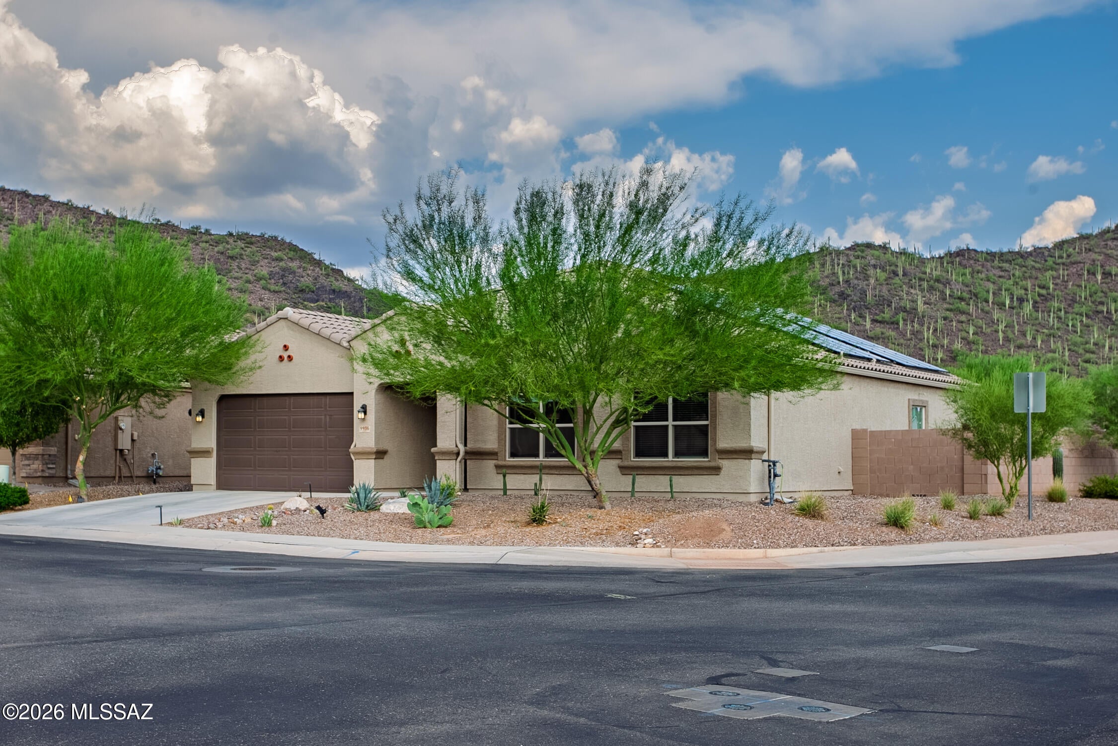 2.25% FHA ASSUMABLE RATE! Beautiful 2021-built 4-bed 2-bath 2-car garage Opal model in desirable Saguaro Bloom! This like-new 1-story home offers a bright, open floor plan w/high ceilings & lots of natural light. Beautiful kitchen features large island, granite counters, espresso cabinetry, stainless steel appliances & walk-in pantry. Primary suite includes dual vanities, garden tub, walk-in shower & walk-in closet connecting to the laundry room. Enjoy an incredible private corner lot w/breathtaking full-range mountain views & no rear / side neighbors! Backyard offers hot tub, firepit sitting area, gated dog run, turf, putting green, pavers & covered patio. Resort-style community pools, hot tubs, gym, clubhouse, splash pad, parks & basketball courts. Solar adds energy savings! Owner/Agent. This home qualifies for a limited-time lender-paid 2-1 buydown -- reduced monthly payments for the first 2 years at no cost to the buyer or seller. Ask listing agent for details!