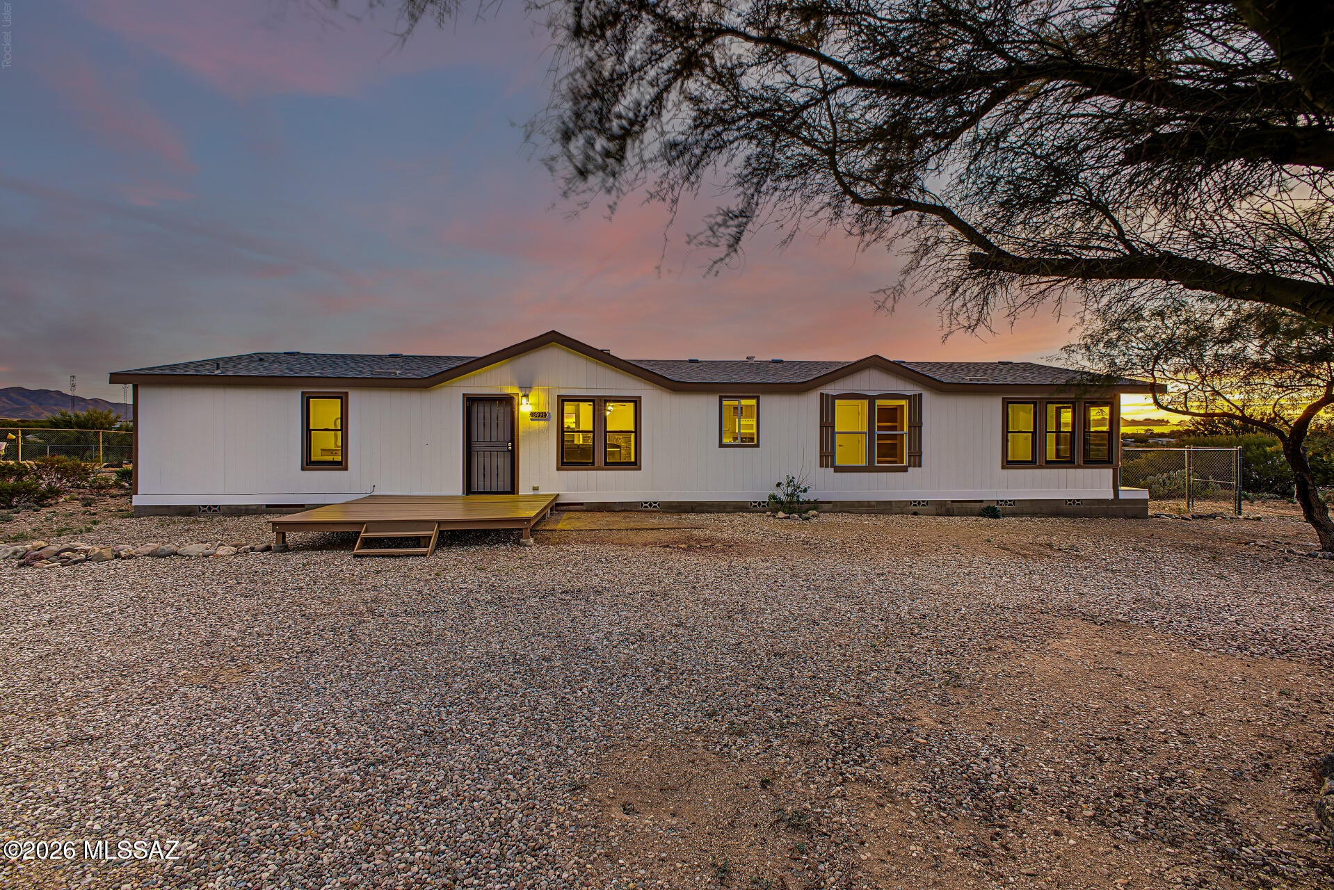 Welcome to this charming 4-bedroom home with beautiful mountain views! The inviting interior features vaulted ceilings, abundant natural light, fresh paint, laminate and linoleum flooring, and a cozy fireplace. The spacious great room flows into the kitchen, which offers built-in appliances, ample cabinetry, a center island, and breakfast nook. The refrigerator and washer/dryer convey with the home.

The large primary suite includes dual vanities, a glass step-in shower, and walk-in closet. Most windows were replaced approximately five years ago with Renewal by Andersen double-hung windows and remain under a fully transferable warranty. Solar panels add energy-efficient appeal.

Furniture is also available for separate purchase.
