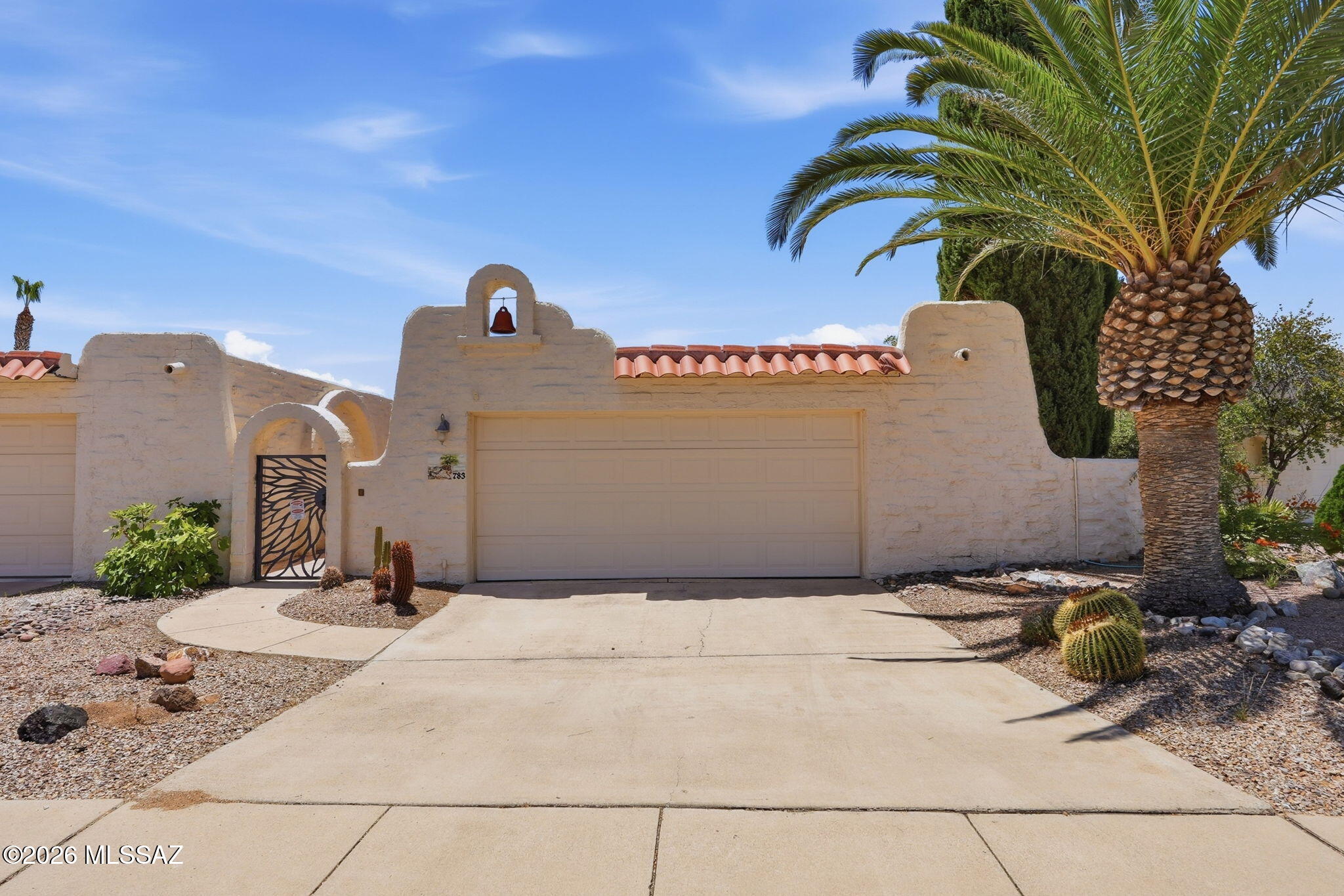 Experience the charm and beauty of the Southwest in this well-maintained home located in the desirable Esperanza Estates community. Featuring classic southwest-style architecture with a distinctive bell tower, this residence offers timeless character combined with thoughtful updates, including a recent roof recoat, newer HVAC system, and newer appliances.

Step inside to discover authentic Saltillo tile flooring, soaring natural light from three skylights, and an inviting open living and dining area designed for comfortable everyday living and entertaining. Accent lighting and a wall of built-in cabinetry add both style and functionality. An adjoining bonus living space provides flexibility for a reading room, hobby area, or relaxing retreat. The efficient kitchen keeps you connected to guests and features a cozy dining nook with direct access to the front courtyard, an ideal setting for morning coffee or enjoying Arizona's beautiful weather.

Outside, a covered patio overlooks a private backyard, creating the perfect space to enjoy cool desert evenings and stunning Southwest sunsets.

Residents of Esperanza Estates enjoy exceptional amenities, including a saltwater pool and spa, pickleball courts, walking trails, parks, a community ramada, and a wood-fired brick oven gathering area. The home does not have GVR, but it can easily be added.

Whether you're seeking a seasonal retreat or a year-round residence, this home offers the relaxed Southwest lifestyle that makes Green Valley such a special place to call home.
