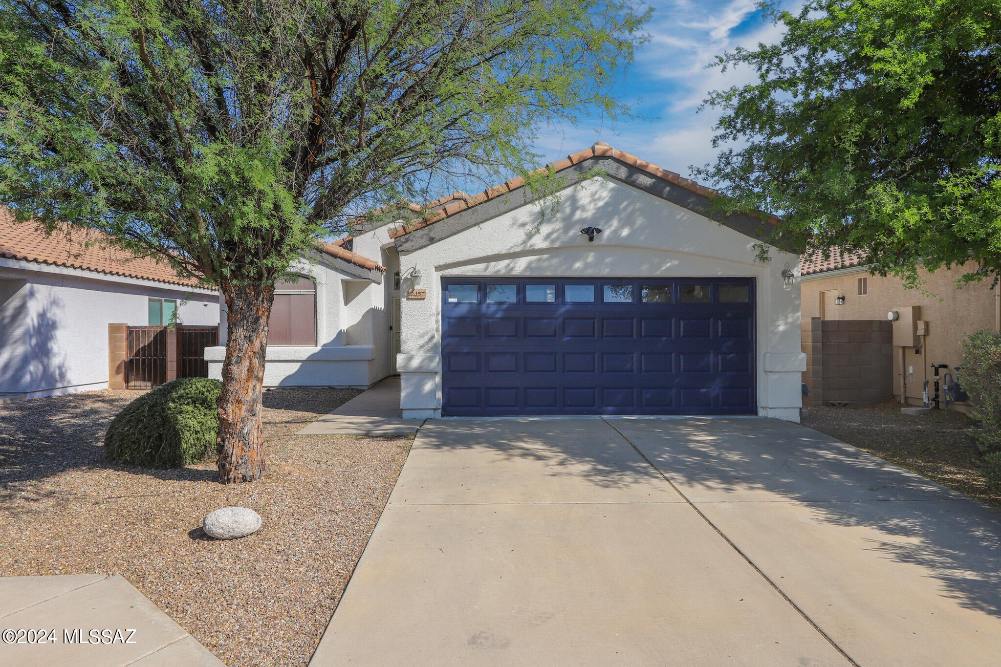 Charming 3-bedroom, 2-bath home located in the highly desired Vail School District. This well-maintained property features a spacious open floor plan, a two-car garage, and access to fantastic community amenities. Enjoy a refreshing dip in the pool, shoot hoops on the basketball court, or explore the scenic jogging and bike paths. Perfect for families or anyone seeking comfort, convenience, and outdoor recreation. Don't miss this opportunity to live in a vibrant community with top-rated schools!