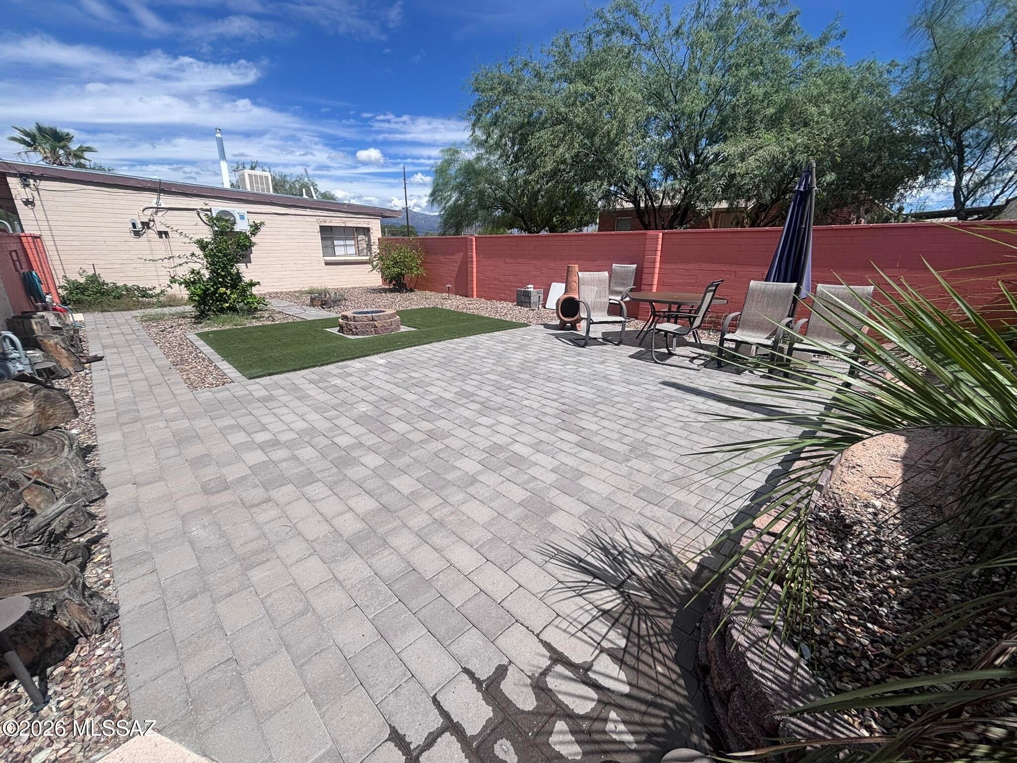 Your Tucson hideaway awaits. This furnished 2 bedroom, 1 bath home delivers an open floor plan, roomy living area, full kitchen, private patio, and a surprisingly large side yard. With laundry on site and off the street parking. Perfect for a simple, comfortable desert getaway