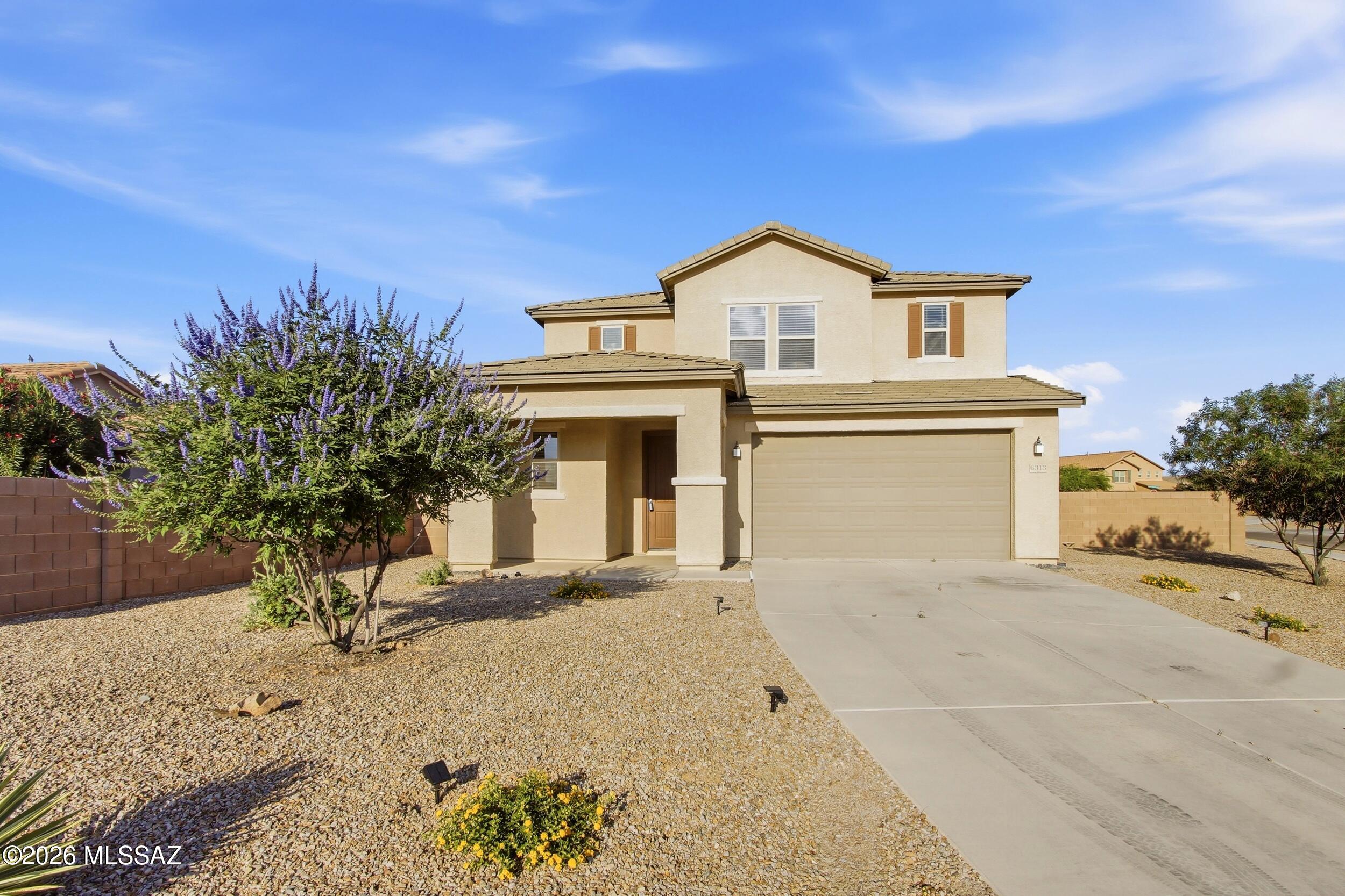Set on one of the largest lots in the neighborhood with rare space between neighbors and an oversized driveway, this updated 4 bed, 3.5 bath home is designed for flexible, modern living. A private downstairs guest suite with ensuite bath is ideal for multigenerational living, extended guests, or a dedicated home office with separation and privacy. Upstairs, a spacious loft adds even more versatility perfect for a second office, media room, gym, playroom, or creative space. Fresh interior paint, tile flooring on the main level, and new carpet create a clean, move-in ready feel. The open concept kitchen and living area offers easy flow for daily life and entertaining. A home built to adapt with you today, tomorrow, and beyond, this is where your next chapter begins!