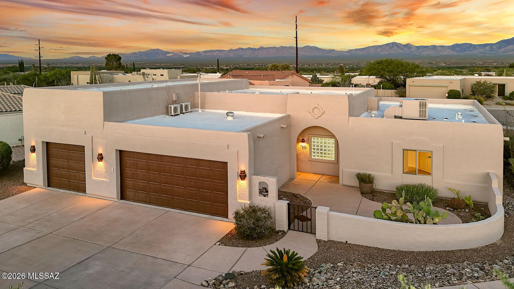 Some homes ask you to choose between living well and living simply. This one says yes to both.
Nestled on a rare, oversized corner lot with enviable privacy and mountain views that stop you mid-sentence, this beautifully updated home strikes a balance few properties ever achieve -- intimate enough for easy everyday living, generous enough to host the people who matter most.
Step inside and the character greets you immediately: dark wood ceilings anchor a bright, updated interior that feels authentically Southwestern without sacrificing a modern edge. Large windows frame those mountain views like artwork, flooding rooms with natural light.  The great room features windows along the back wall, looking out to the patio and mountain views.  The kitchen gleams with new appliances and counter tops.  Your primary suite has mountain views of its own and an updated bathroom with tiled walk-in shower.  The guest suite is being used as a den but is perfect for guests or projects.  Outside is where this property truly earns its place. The covered patio with full outdoor kitchen sets the stage for al fresco dining evenings,  and the kind of unhurried gathering that lingers long after the plates are cleared. The fire pit area and built in banco invite conversation and star gazing.  The spacious back yard wraps the home in privacy and breathing room, and the front court yard adds curb appeal and another gathering space to watch the Arizona sunsets.  
For the car collector, RV adventurer, or travel enthusiast, this is the crown jewel. An extraordinary oversized RV garage -- with both front and rear drive-through access -- is attached to an additional three-car garage. At this price point, that combination is genuinely hard to find, and finding it without the burden of a sprawling estate that demands your weekends and your wallet? That almost never happens. 
Low maintenance. High character. Mountain views from the sofa and from the patio table. A garage that dreams are made of.
This is the one you've been waiting for.