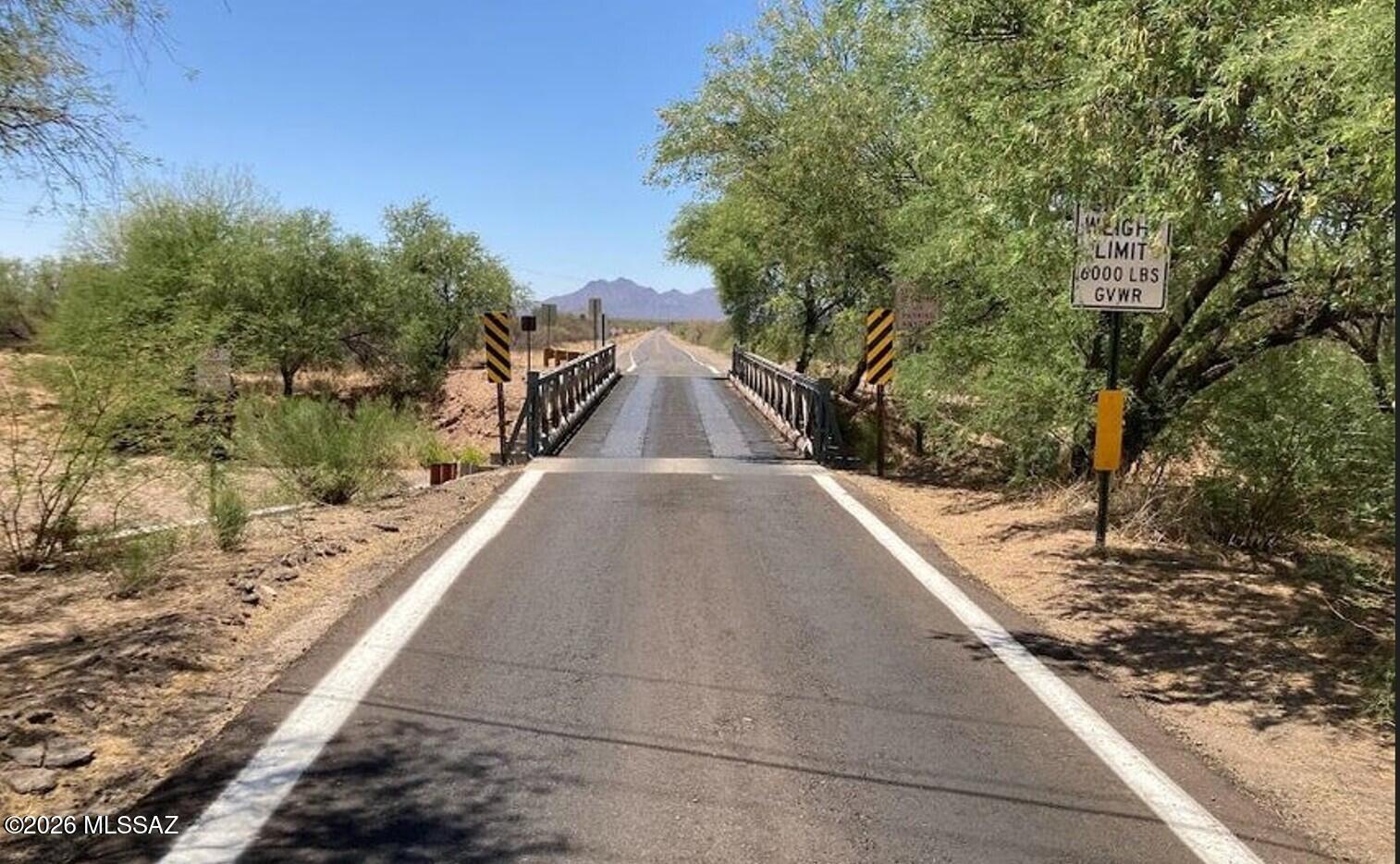 Rare opportunity to own 13.05 acres of pristine desert in Ironwood  Forest Nat'l Monument.   Three ADJACENT HOMESITES being sold as a package with 25gpm Well Share.  Amazing Views surround you from every direction with breathtaking views and awe inspiring Sunsets.   Horse Property- Walk, Bike, Ride to the Monument.  Road is paved and maintained by the County.  Utilities to the lot line with 1/5th well share per lot for a total 3/5 well share for the package.  Septic required, not installed.

Custom build to suit or MSFR.  Family compound opportunity, homestead living.  Dream opportunity in Marana, AZ- Pima County -Ironwood Forest NM and Silverbell Mountains.  USDA Eligible property maps included.

Owner is licensed to sell real estate in the state of AZ.  Owner/Agent