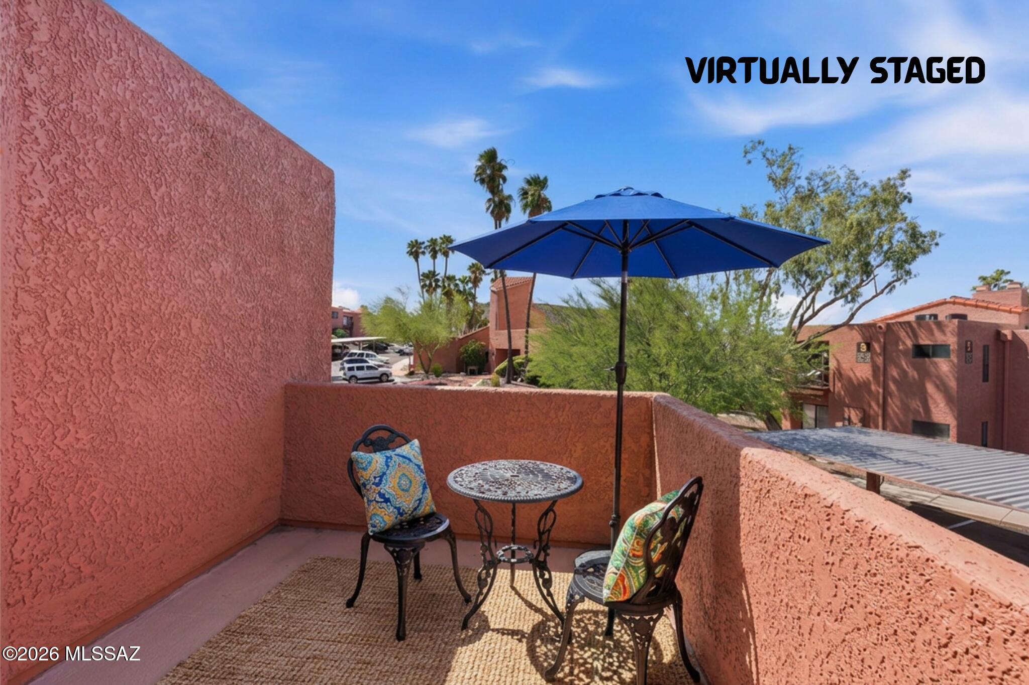 Tucked into the gated Ventana Vista community in the Catalina Foothills, this updated 2BR/1BA condo delivers resort-style living with fantastic MT views. A Jack-&-Jill bath connects both bedrooms for smart, functional flow. Tile flows through all main living areas, complemented by abundant natural light. Step onto your private deck to soak in the views, or relax knowing the HVAC was replaced in 2023. Front row covered parking adds everyday ease. Stunning Plantation  Shutters. Set on 20 acres of desert landscaping, Ventana Vista offers a clubhouse, fitness center, heated pool, spas, tennis and pickleball courts, and walking paths -- all within a secure, gated setting minutes from Sabino Canyon, shopping, and dining. Move-in ready, perfect as a primary residence, second home, or investment.