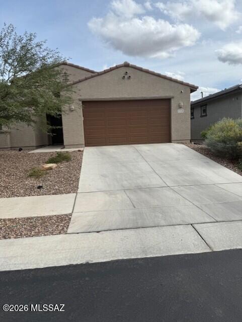 Energy efficient home in Saguaros Viejos II subdivision in Oro Valley.  Home is a split bedroom floor plan with 4 bedrooms, 3 baths plus a den with double doors for privacy. Kitchen features granite counters with dining area and a great room concept.  Master bath has double vanities and large walk in closet.  The backyard has unbelievable mountain views, covered patio and room for a pool.