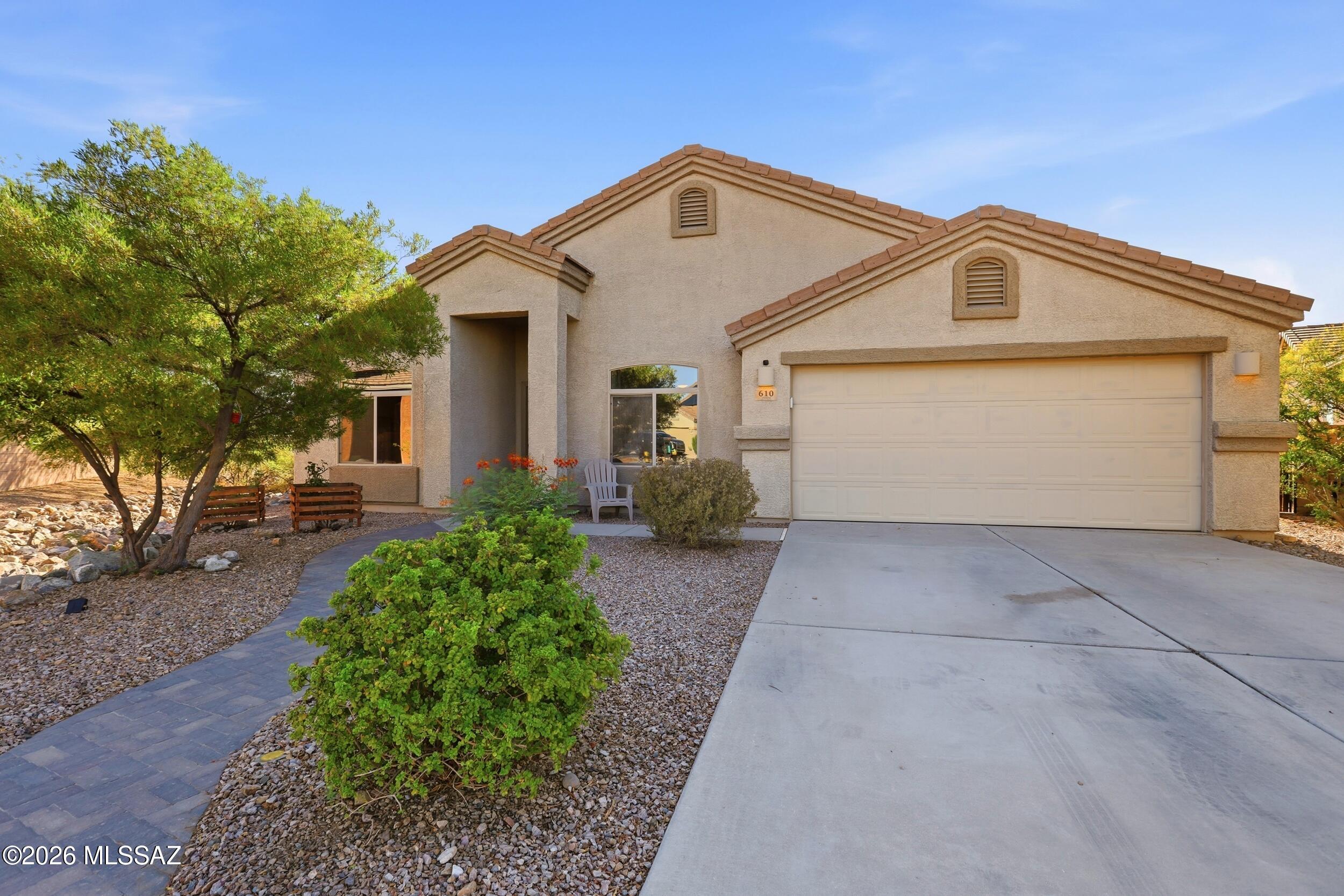 Spacious and beautifully maintained, this 4-bedroom, 2-bathroom home offers 2,291 square feet of thoughtfully designed living space with an open, airy layout and tile flooring throughout. The expansive great room is perfect for entertaining, while the versatile den provides the ideal space for a home office, playroom, or flex area.
The well-appointed kitchen is designed for both everyday living and entertaining, featuring a breakfast nook that has already been prepped for a future wet bar with a counter-height electrical outlet and plumbing access. Enjoy top-of-the-line appliances, including a Bosch dishwasher and a Samsung Bespoke appliance package featuring a refrigerator with an AutoFill filtered water pitcher, dual ice makers with cubed ice and Ice Bites™, and a Bespoke dual-fuel .. 5-burner convection range. The range includes Air Fry, a wok grate, integrated griddle, a dual-ring brass power burner producing up to 23,000 BTUs for rapid boiling and high-heat searing, and the innovative Flex Duo" system, allowing you to cook two dishes simultaneously at different temperatures.
The spacious primary suite offers a beautifully designed bathroom with a dual vanity for added comfort and convenience.
Step outside to a professionally finished backyard featuring elegant pavers, creating the perfect setting for relaxing evenings, outdoor dining, and entertaining guests.
Additional upgrades include a 220-volt outlet in the garage, ideal for EV charging or powering high-demand workshop tools.
Offering exceptional space, premium upgrades, and modern functionality, this home is truly move-in ready and designed to accommodate today's lifestyle.