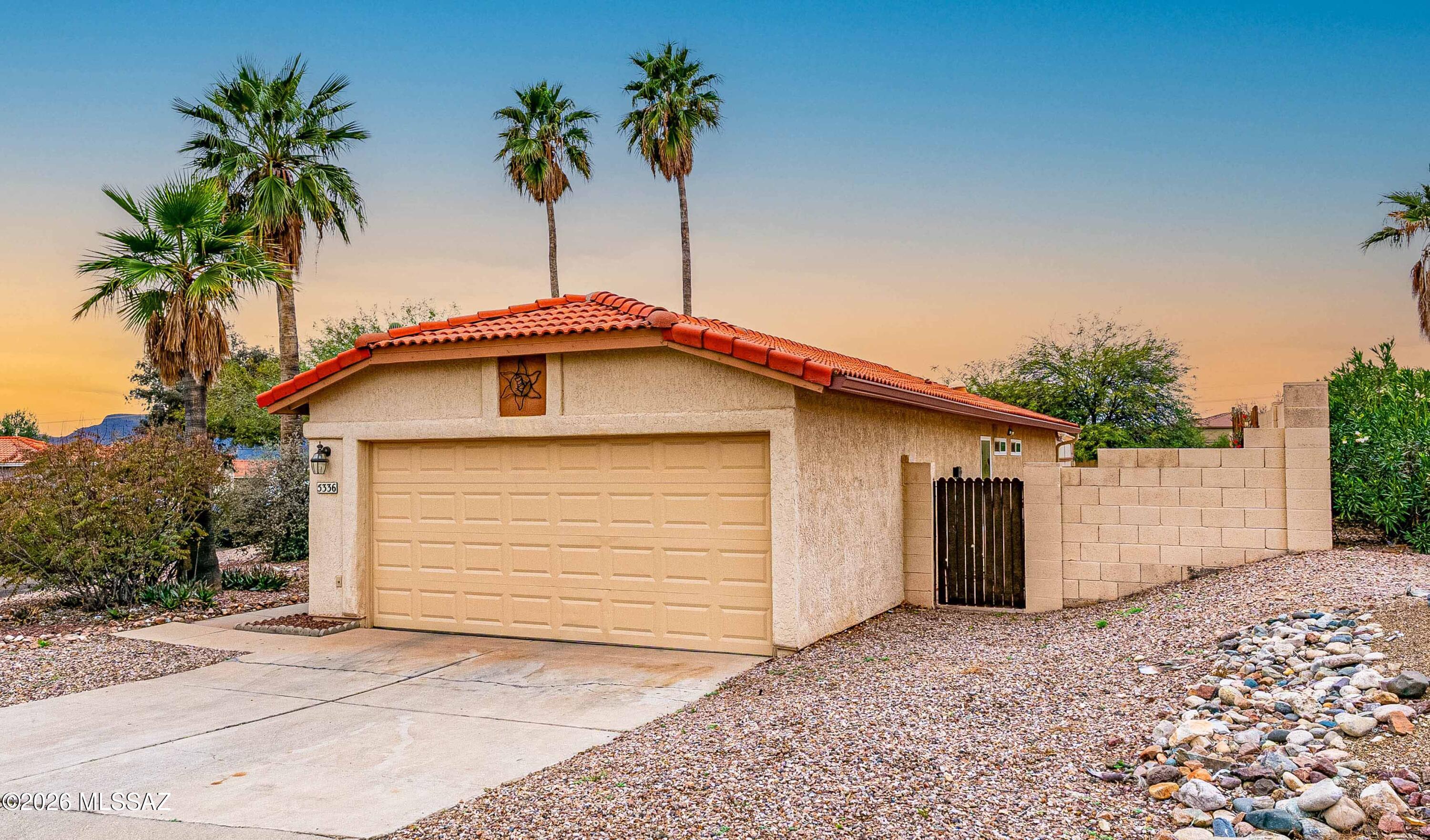 Bright and cheerful single-story gem on a premium corner lot...and one of the largest lots in the neighborhood! 2 bedrooms with den/flex space, 2 bathrooms, 1,299 sqft, BRAND NEW HVAC unit, cozy wood-burning fireplace and built-in shelving in living room. Tiled flex room with sliding doors can be home office, gym, hobby room--or converted into a 3rd bedroom!  Updated kitchen with wood cabinets, crown molding, granite countertops, and stainless steel appliances. Entertainer's backyard with built-in BBQ, built-in smoker, garden beds, electric awning for extra shade, shed for extra storage, and gate access to the wash. Brand-new 3-ton HVAC with 10-year warranty!  New thermostat!  Newer water softener!  Newer exterior paint!  Recently coated flat roof section! No polybutylene pipes! Tile floors throughout except bedrooms.  Murphy bed in the guest room.  All appliances stay, including refrigerator, washer, and dryer.  Community pool right across the street to cool off on hot summer days. Minutes from businesses, shopping, dining, hospital, schools, hiking, and Interstate.  This home is waiting for you!