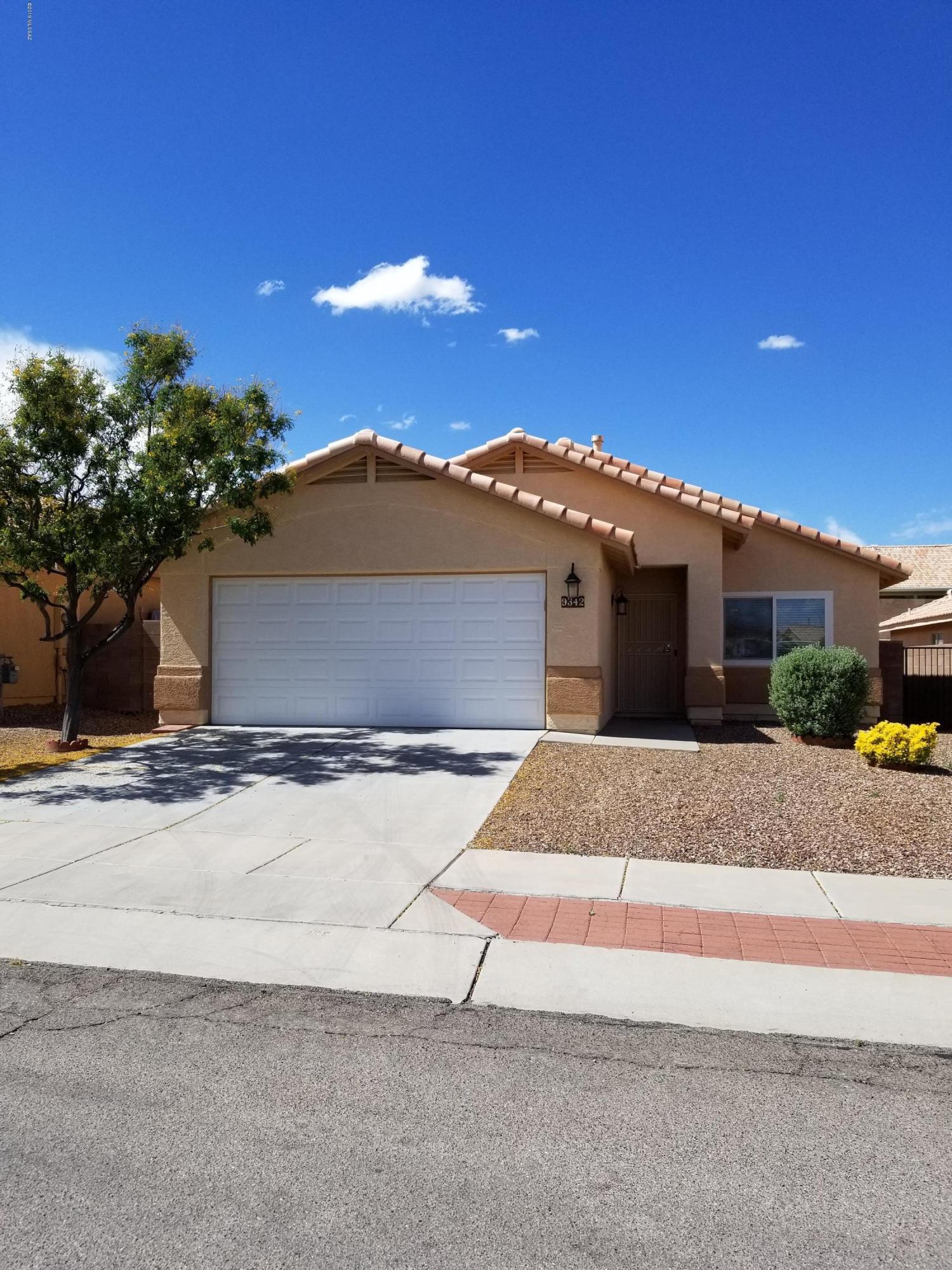 NO HOA.  This three-bedroom, two-bath home features:  gorgeous new black stainless steel appliances, eat-in kitchen area, breakfast bar, water softener and reverse osmosis, Anderson windows and upgraded carpet. No pets