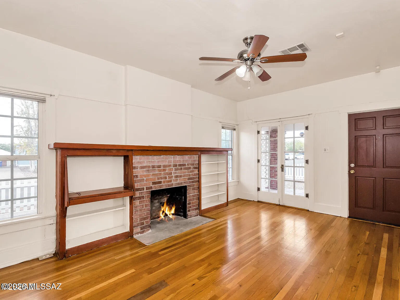 Pre-leasing for July 2026. Please do not disturb the tenants. Showings are available with a 48-hour notice to the current tenants.

This vintage 2-bedroom, 1-bathroom red brick Craftsman home is located just a 1/2 mile from the University of Arizona. 725 square feet of living space with original golden oak hardwood floors or tile floors throughout. The living area features a decorative fireplace, built-in shelving, and a ceiling fan. The full bath includes a tub. Private fenced yard and front patio that faces Euclid.
The recently updated kitchen offers an expansive amount of white cabinetry, a built-in pantry, and a full-size washer and dryer. This home is offered ONLY to NON-SMOKING TENANTS. NO PETS.