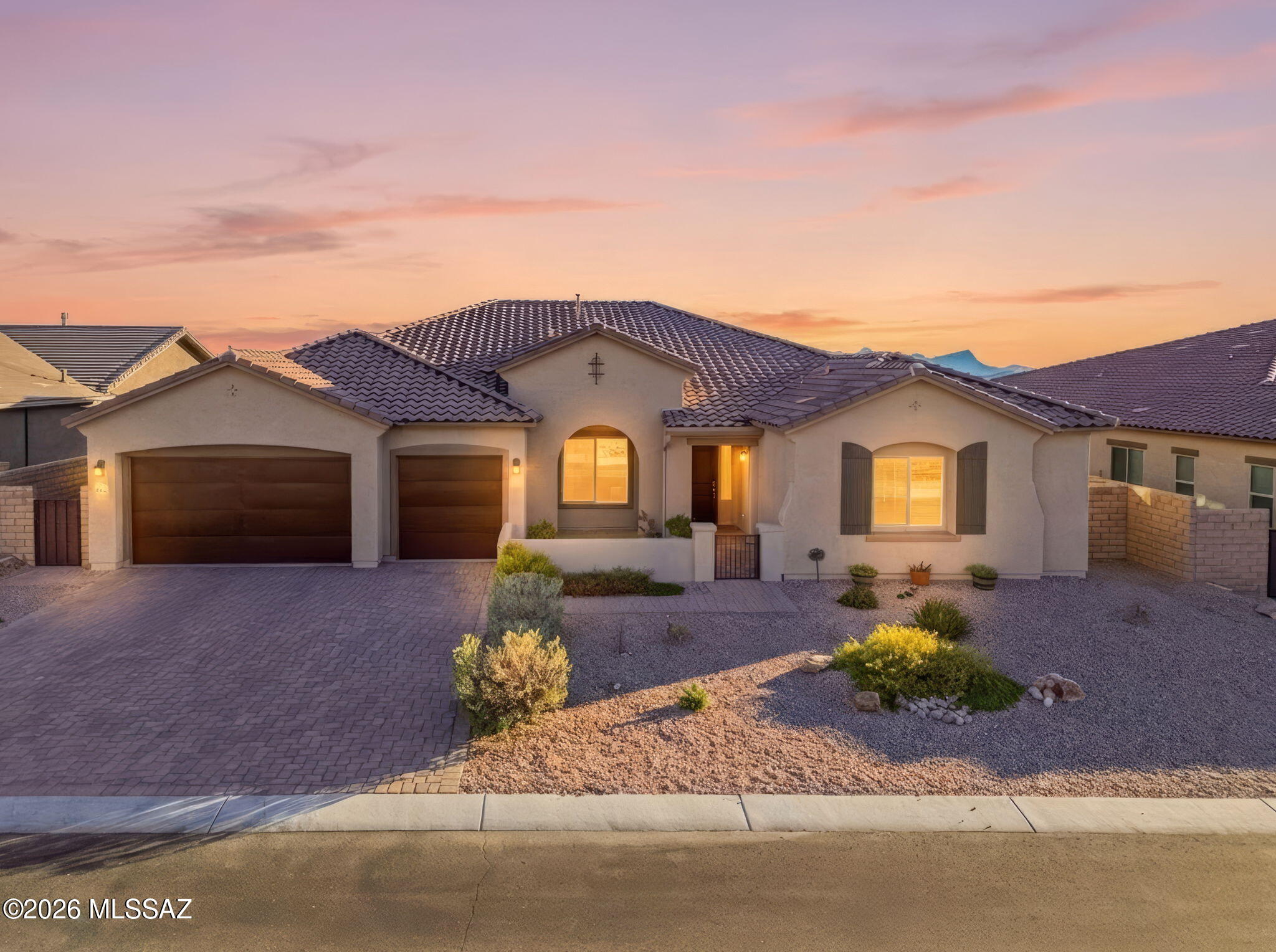Almost brand new, located in gated community - Dove Mountain. Main house is 4 bed,4bth + built-in library & 1 bed, 1 bth attached guest house w/kitchenette.  Overextended 3 car gar & roman style pebble tech swimming pl backs up to spacious green area w mtn views. Walking distance from golf courses & Ritz Carlton Hotel.  Just minutes from restaurants & shopping.  Enjoy the high ceilings, custom finishes throughout, large picturesque windows/sliding doors & natural light. Split bedrm floorplan, 4 zoned hvac, HERS Index insulation, butler's pantry, keydrop area, sink in laundry, 2 large walk-in closets in master.Access to laundry rm from master bed.Kitchen inc granite, stainless steal, pull out shelves, soft close, pot filler, under counter lights. Alarm system & new wrought iron front door. The following are additional amenities the neighborhood offers:
Gated Community
Dove Mountain Golf Course
Highlands Golf Course
Ritz Carlton
The Gallery is a Recreation Fitness Club with restaurant, bar and pools, and workout classes. Perfect for family fun and good health.
Bicycle Trails
Night Sky Lighting
36 miles of hiking trails
STEM schools
Outlet shopping, Urgent Care, Frys and Walgreens very close by.