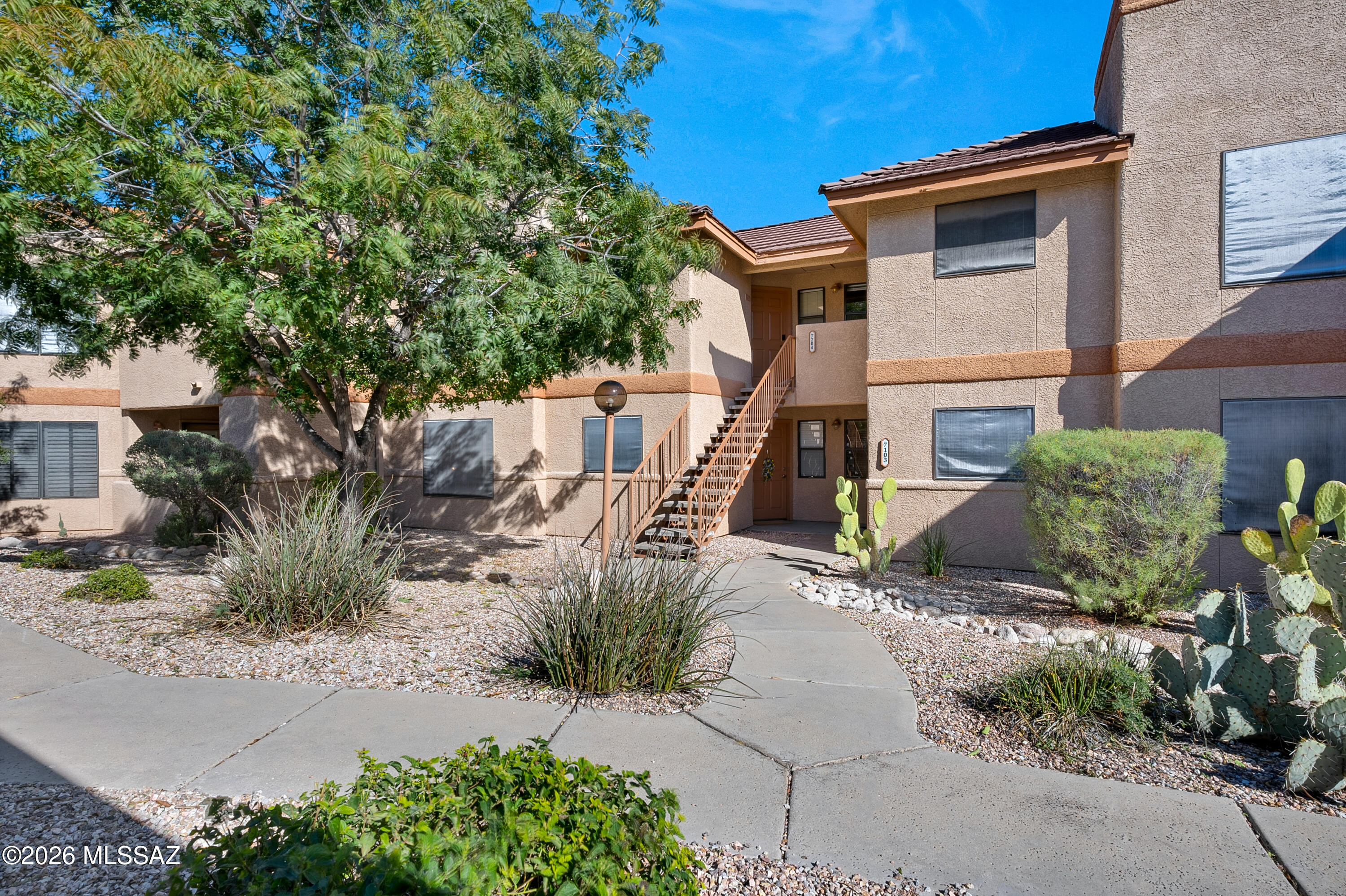 Experience elevated desert living in this immaculately maintained 2-bedroom, 2-bath condo nestled within the gated Villas at Sabino Canyon. Perfectly positioned on the second floor, this residence showcases breathtaking Catalina Mountain views while backing to a serene wash--offering exceptional privacy and front-row seats to local desert wildlife. The desirable split-bedroom floor plan is ideal for both everyday living and hosting guests, complemented by newer wood-laminate flooring and a recently installed A/C for year-round comfort and peace of mind. Step onto your private balcony and unwind as you take in the sweeping mountain scenery and tranquil desert surroundings. Residents enjoy resort-style amenities, including a sparkling pool, soothing spa, and well-equipped fitness center. Ideally located just minutes from Sabino Canyon, renowned hiking trails, dining, shopping, and everyday conveniences, this condo offers the perfect blend of natural beauty, privacy, and low-maintenance living--an exceptional desert retreat or ideal lock-and-leave lifestyle. Schedule your private showing today and experience the views for yourself.
