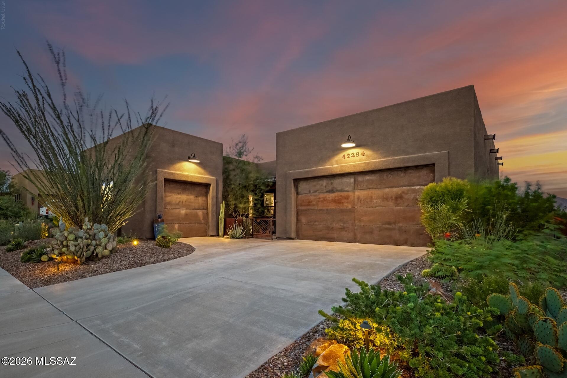 Contemporary desert style meets vibrant Southwestern character in this beautifully designed 3-bedroom, 2.5-bath home with 2,404 sq ft. Thoughtful details throughout include colorful tile accents, warm architectural finishes and a spacious kitchen with generous cabinetry and island seating. The backyard is a true retreat, featuring a sparkling pool and spa with waterfall, lush desert landscaping and multiple spaces to relax, gather and enjoy Arizona evenings. Owned solar and a 3-car garage complete this one-of-a-kind home.