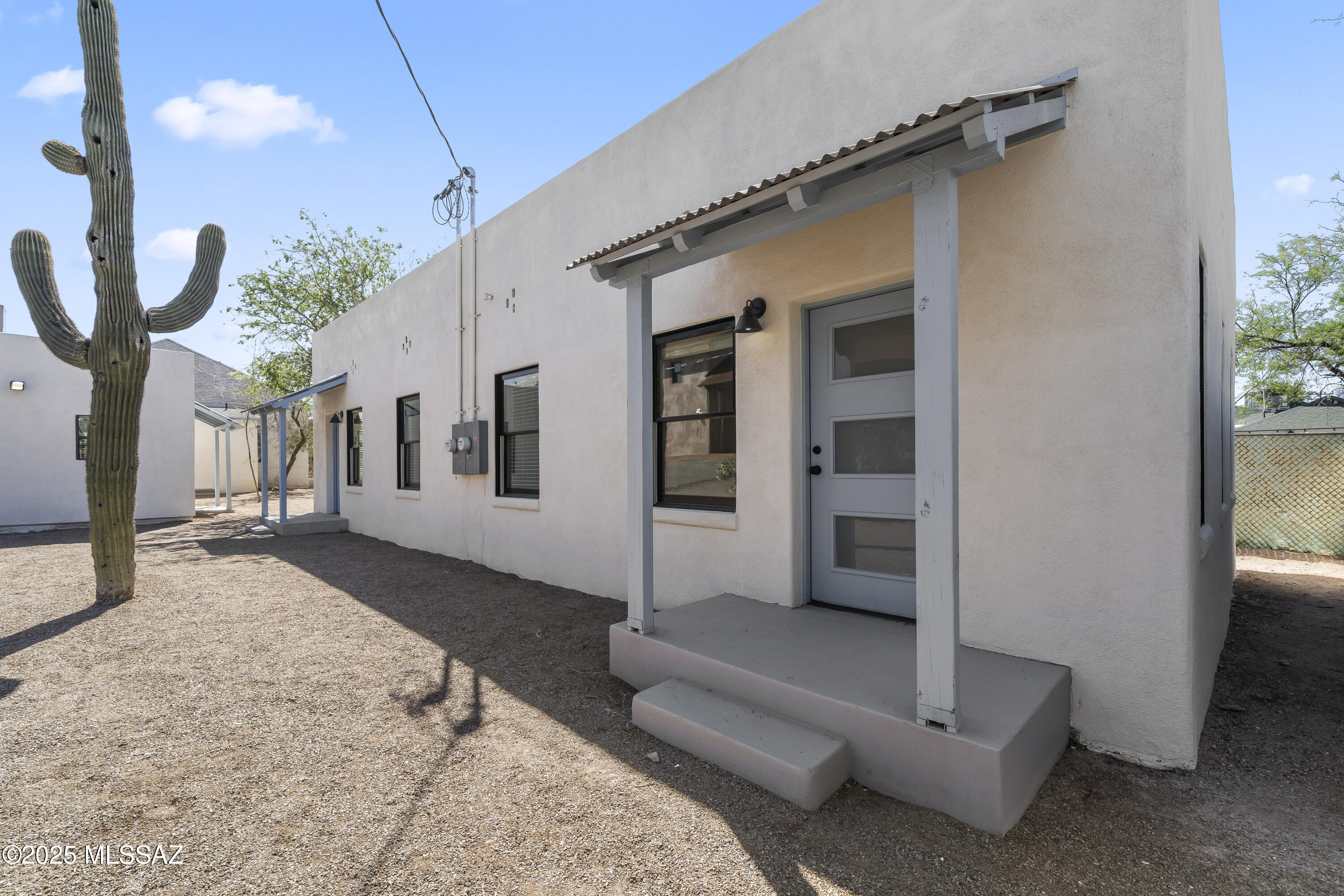 Charming 1BR/1BA duplex located in the historic West University neighborhood, just minutes from Downtown Tucson, University of Arizona and Pima Comm College. This is 1 of 2 units that will be available. Territorial Style home was fully remodeled 1 year ago and blends modern amenities with timeless historic charm. Cozy Living Room is bright and inviting, home is enhanced by neutral finishes, ceiling fans, overhead lighting, and an almost new HVAC system. Updated kitchen features SS appliances, generous cabinetry, great counter space, while the bathroom offers a beautifully tiled walk in shower. Enjoy the front entry awnings, private fenced backyard ideal for relaxing, and convenient off street parking. Separate laundry room building includes your own Washer, Dryer, & Storage Area.