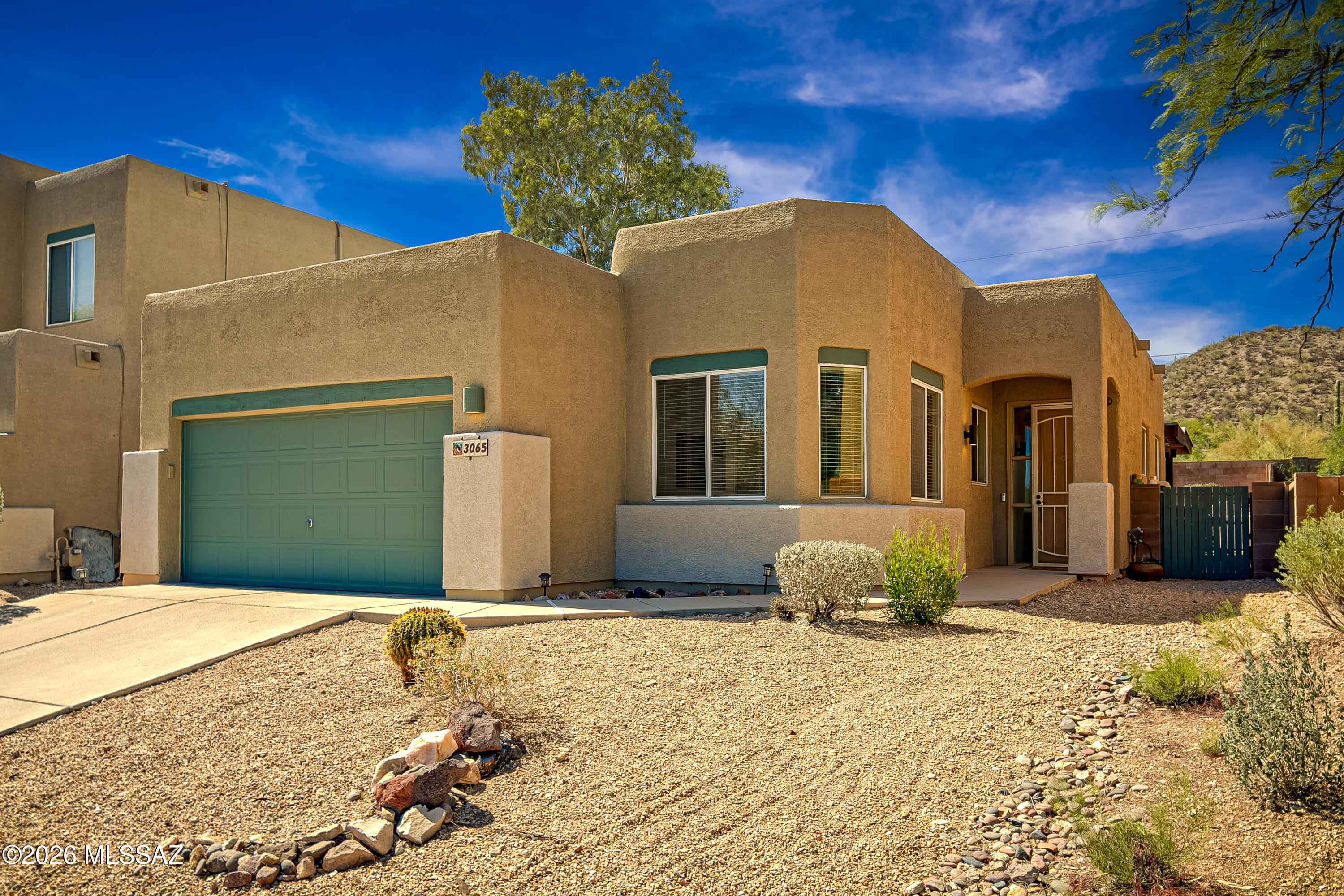 Welcome to your Tucson West Side retreat!  This beautifully maintained 3 bedroom, 2 bath home offers 1,426 sq ft in a quiet cul-de-sac with stunning Tucson Mountain views.  Enjoy a remodeled kitchen with separate dinning area, a spacious primary suite with walk in closet