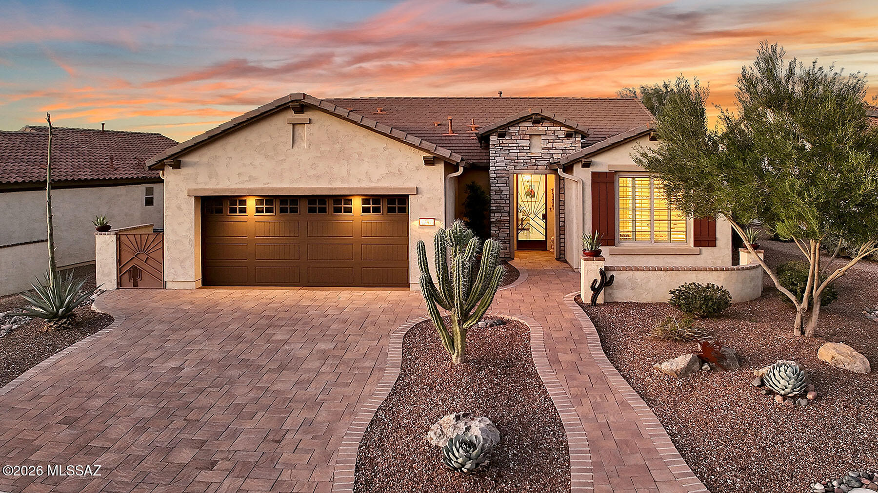 Nestled within the coveted resort community of Quail Creek, this impeccably finished residence has been thoughtfully designed for one purpose: to let you live beautifully, effortlessly, and fully.  Many practical upgrades enhance the beauty and functionality of the home.  Step through the back door and into a private sanctuary that was made for gathering, relaxing, and making memories that will last a lifetime. The generous covered patio -- finished with elegant pavers underfoot -- creates a seamless indoor-outdoor living experience that defines the very best of desert resort life. Whether you are hosting a sunset dinner party or sharing a quiet morning coffee, this space becomes an extension of the home itself Inside, the home unfolds with a sense of calm
 that is immediately felt and hard to leave behind. Bright, open, and flooded with natural light, the interior spaces have been finished with the kind of quality that speaks quietly but says everything. Luxury finishes throughout -- from gleaming surfaces to tasteful hardware and on-trend fixtures -- combine to create an aesthetic that is as serene as it is sophisticated. Nothing feels overdone. Everything feels intentional.
The open-concept main living areas flow with an effortless grace, designed for both everyday comfort and elevated entertaining. Clean lines and a modern sensibility make the home feel current and fresh, while warm finishes ensure it never feels cold or sterile. Light pours in from every angle, making each room feel expansive and alive throughout the day
One of the home's most practical and appreciated features is its large, versatile den. Whether used as a home office, a media room, a craft studio, or a private reading retreat, this generous bonus space adapts beautifully to however your life evolves. And when guests arrive? Simply close it off. 
This is the home for those who have spent a lifetime building something remarkable, and who now deserve a living experience that reflects that. Elegant without being fussy. Low-maintenance without sacrificing an ounce of quality. Set within one of Southern Arizona's most prestigious active adult communities, and finished with the kind of care and attention that makes it feel like it was designed just for you!