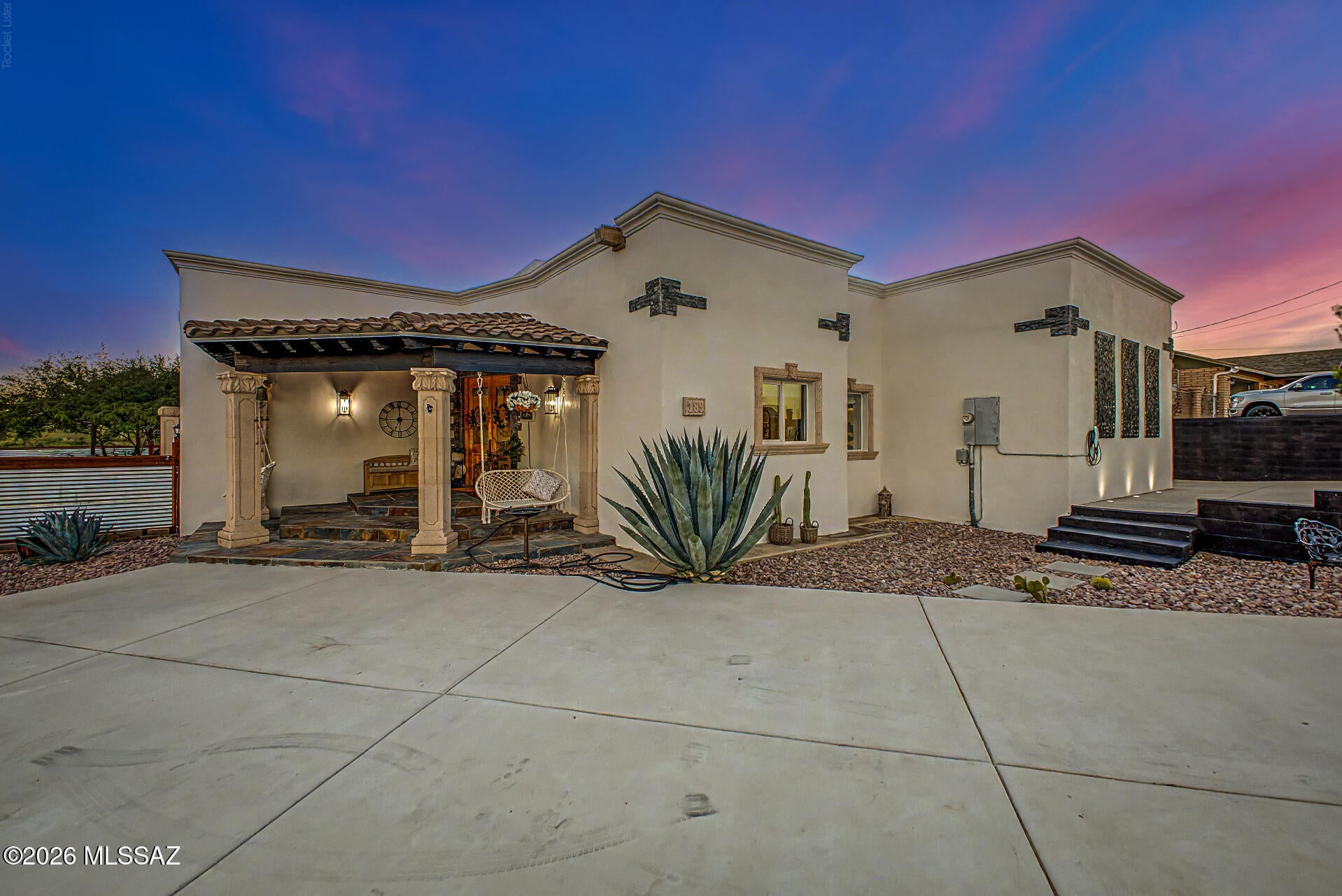 Fantastic opportunity to own this sprawling 1.2-acre property on a cul-de-sac! You're greeted w/ majestic mountain views, a desert landscape, & an inviting front patio. Inside, you'll find coffered ceilings, crown moulding, a soothing palette, wood-look flooring, & a serene living room. The gourmet kitchen comes w/ granite & butcher block counters, custom cabinetry, chic pendant lighting, stainless steel appliances, & an island w/ a breakfast bar. You'll also find a sizeable bonus room, providing a versatile space for a family room or lounge. Enjoy added convenience with two washer/dryer sets, including a brand-new GE washer/dryer combo. The main bedroom showcases sliding door access to the backyard, a lavish ensuite w/ dual sinks, a jetted tub, & a walk-in closet. Enjoy enchanting sunsets in the fully enclosed backyard with corrugated fencing, complete w/ a sizeable patio, natural grass, & panoramic views. Make it yours!