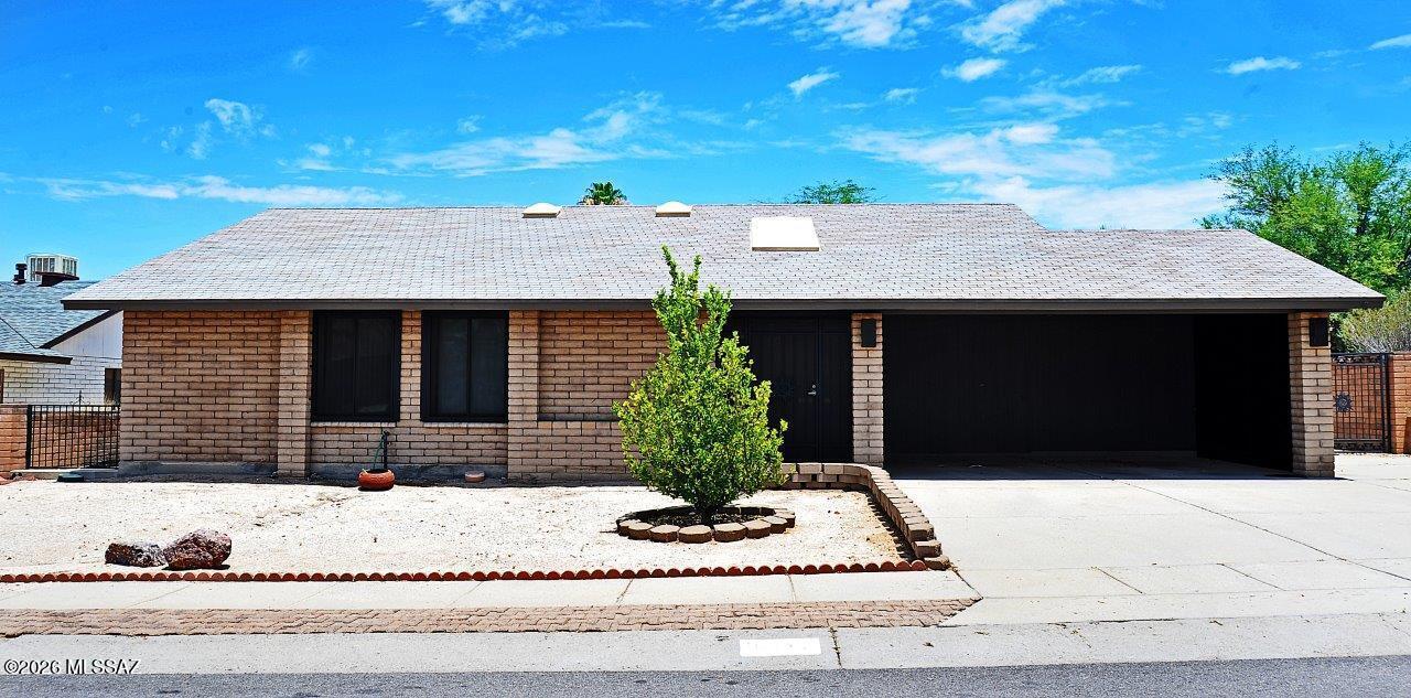 Enjoy this upgraded home with north facing backyard. Equipped for RV parking. No HOA. Kitchen remodeled with granite counters, new cabinets, gas range , built in microwave, and three pantries. Master bedroom with walk in closet, upgraded bath with granite and walk in shower. Laundry room with storage, and sink. Large backyard with covered patio, and storage building. Available for quick close.