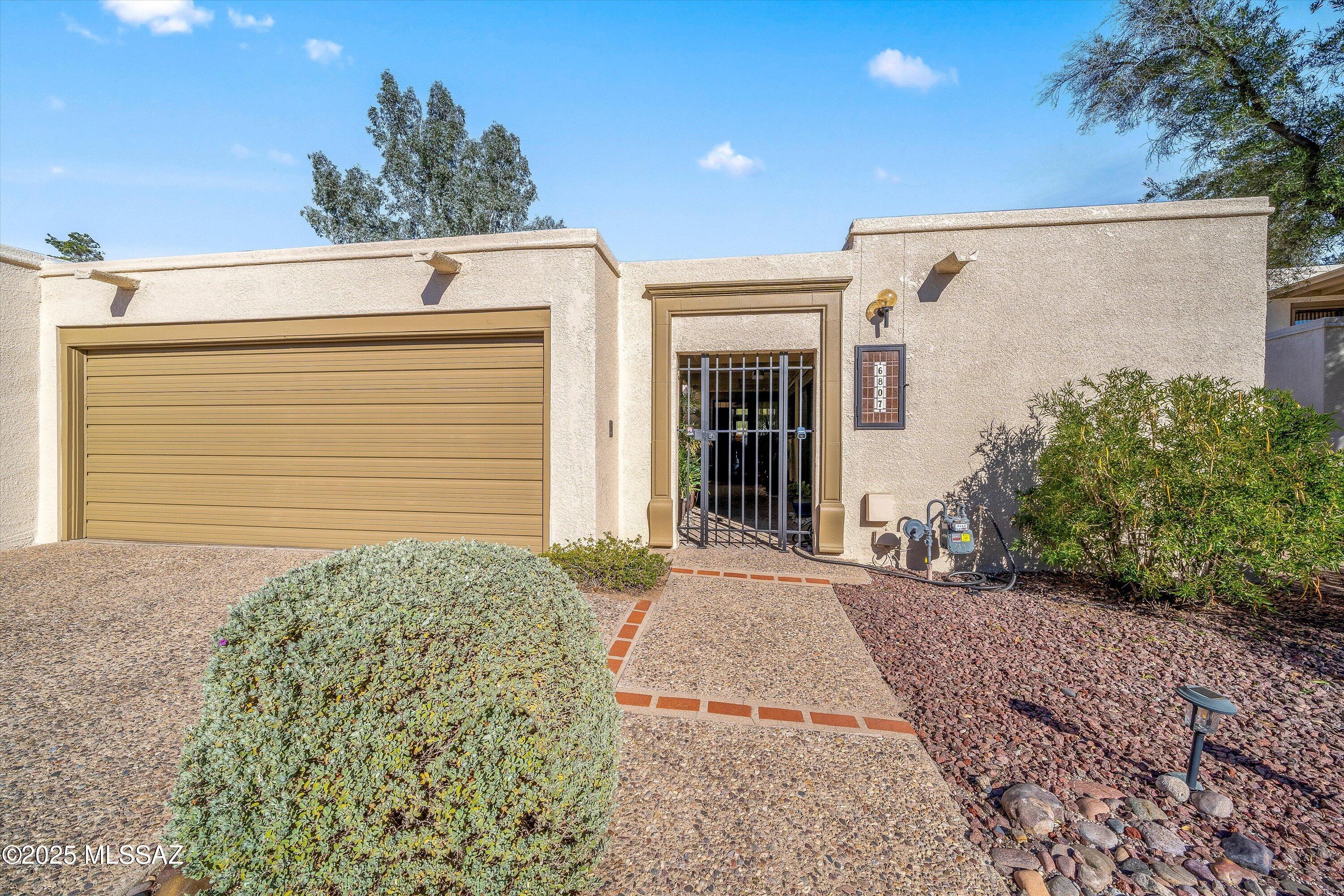 Located in the desirable Dorado Country Club Estates, this charming single-story townhouse features 3 bedrooms and 2 bathrooms with low-maintenance flooring. The elegant formal dining room boasts high ceilings, while the cozy living room centers around a warm fireplace. The kitchen includes a delightful breakfast nook, perfect for casual dining.
The primary bedroom has a spacious walk-in closet and a patio door leading to a covered back patio with trees. The attached primary bathroom offers dual sinks and a luxurious walk-in shower. Additional conveniences include a spacious laundry room and a detached 2-car garage with ample storage.

Enjoy a welcoming front courtyard leading to a lovely foyer. Plus, the community pool, spa, and guest parking are just a short walk away. This home trul