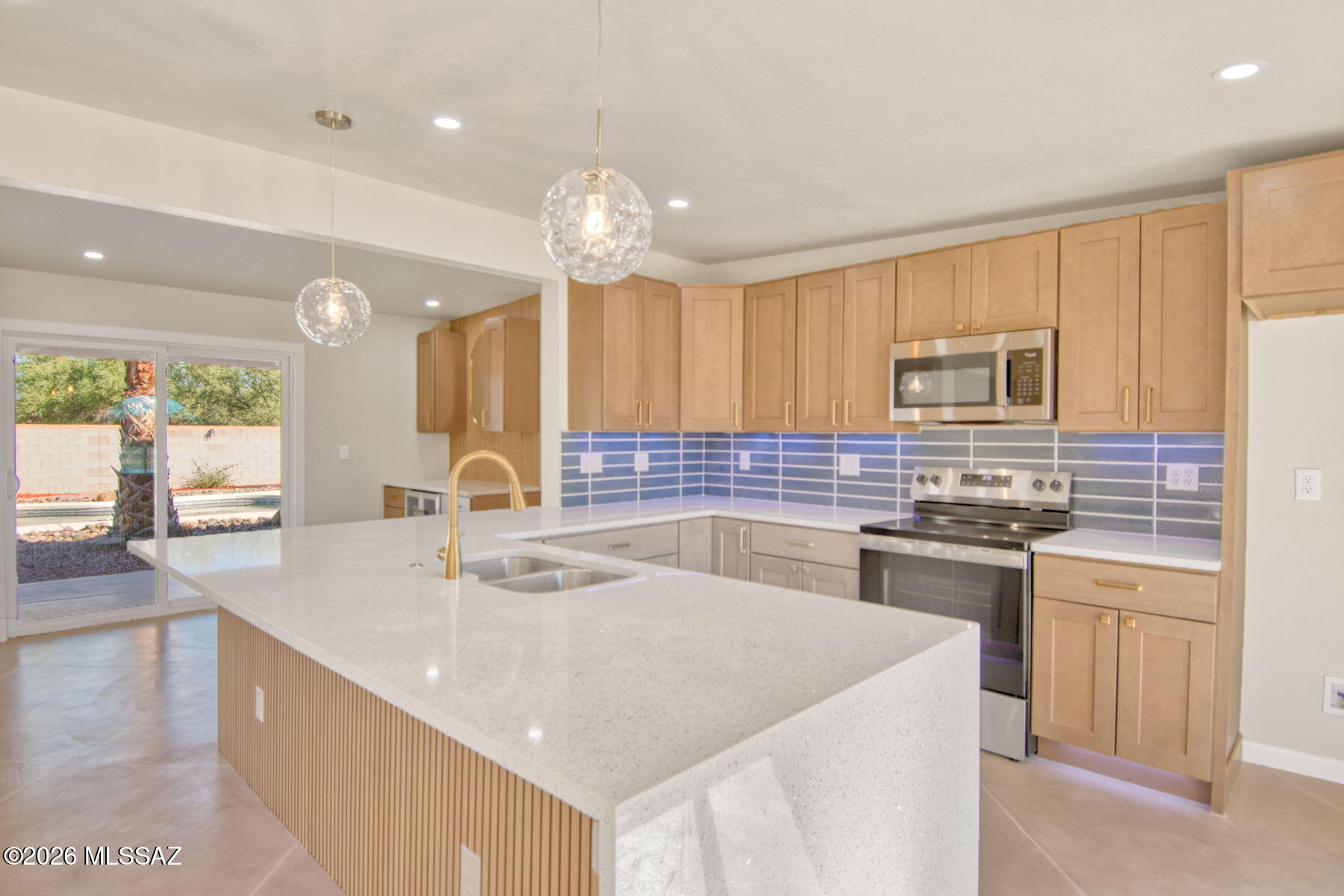 Spectacular remodeled home in desirable Casas Adobes area. 4 bedroom 2 bath on a .83 acre lot with sparkling pebble tech pool and spacious walled in backyard. This is a ''WOW'' house! Custom easy care concrete floors, huge kitchen with large island/breakfast bar and all new cabinets. Quartz counter tops, new Stainless steel appliances, wet bar, and beautiful designer touches throughout.  Two car garage, low care landscaping , nice curb appeal and hard to find privacy. No HOA! Great northwest Tucson location near good schools, restaurants, shopping and easy I-10 access. Owner/Agent