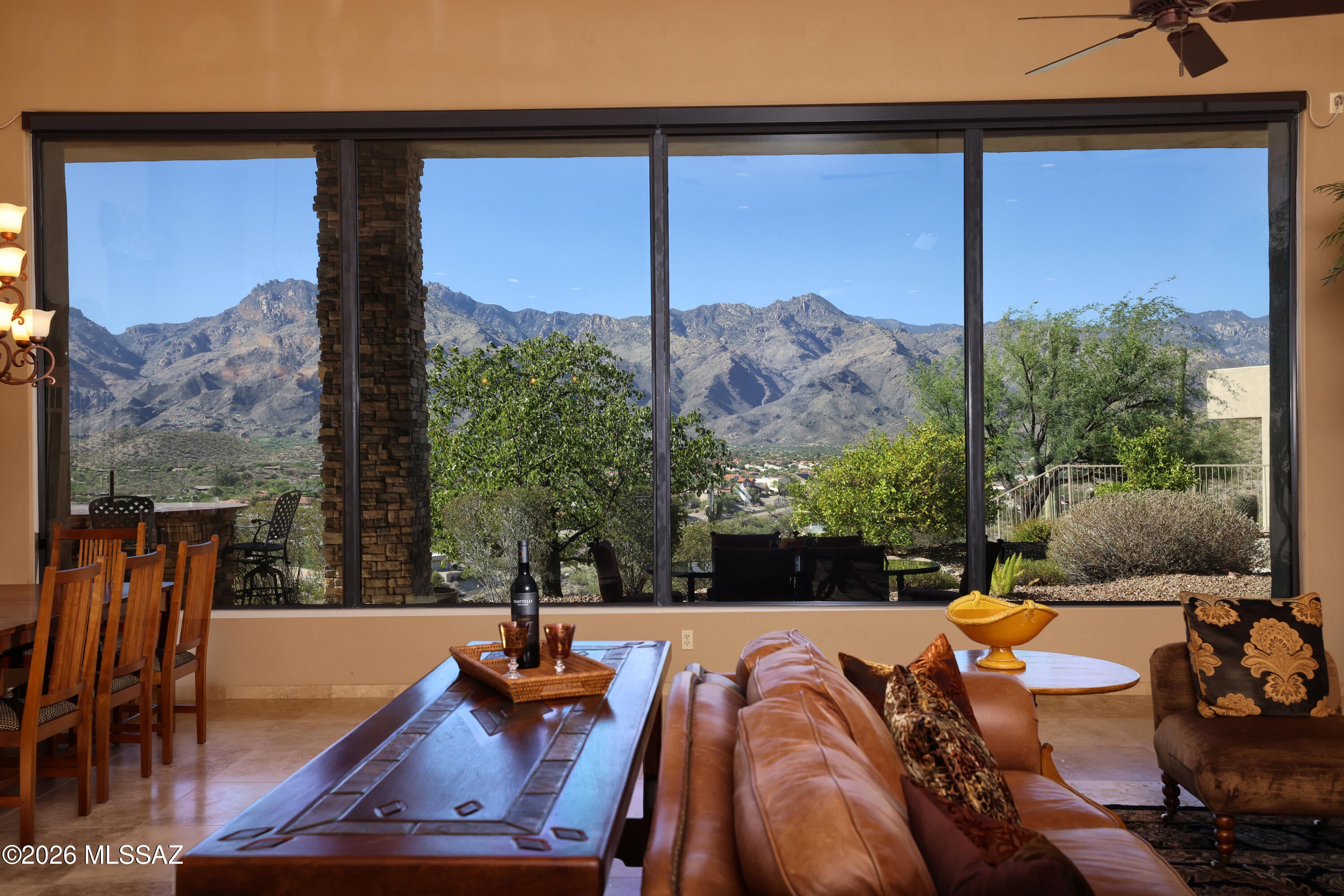 Totally delightful and very spacious 4 Suite plus Office 4,756 SF custom residence in gated Sabino Mountain. You'll LOVE the bright, open greatroom with high ceilings and windows framing amazing Catalina and sunset views! The highly functional layout offers privacy and forever views on a prime 1.63 Acre clifftop site in a second gated area within this prestigious Foothills community with rec area and pool.