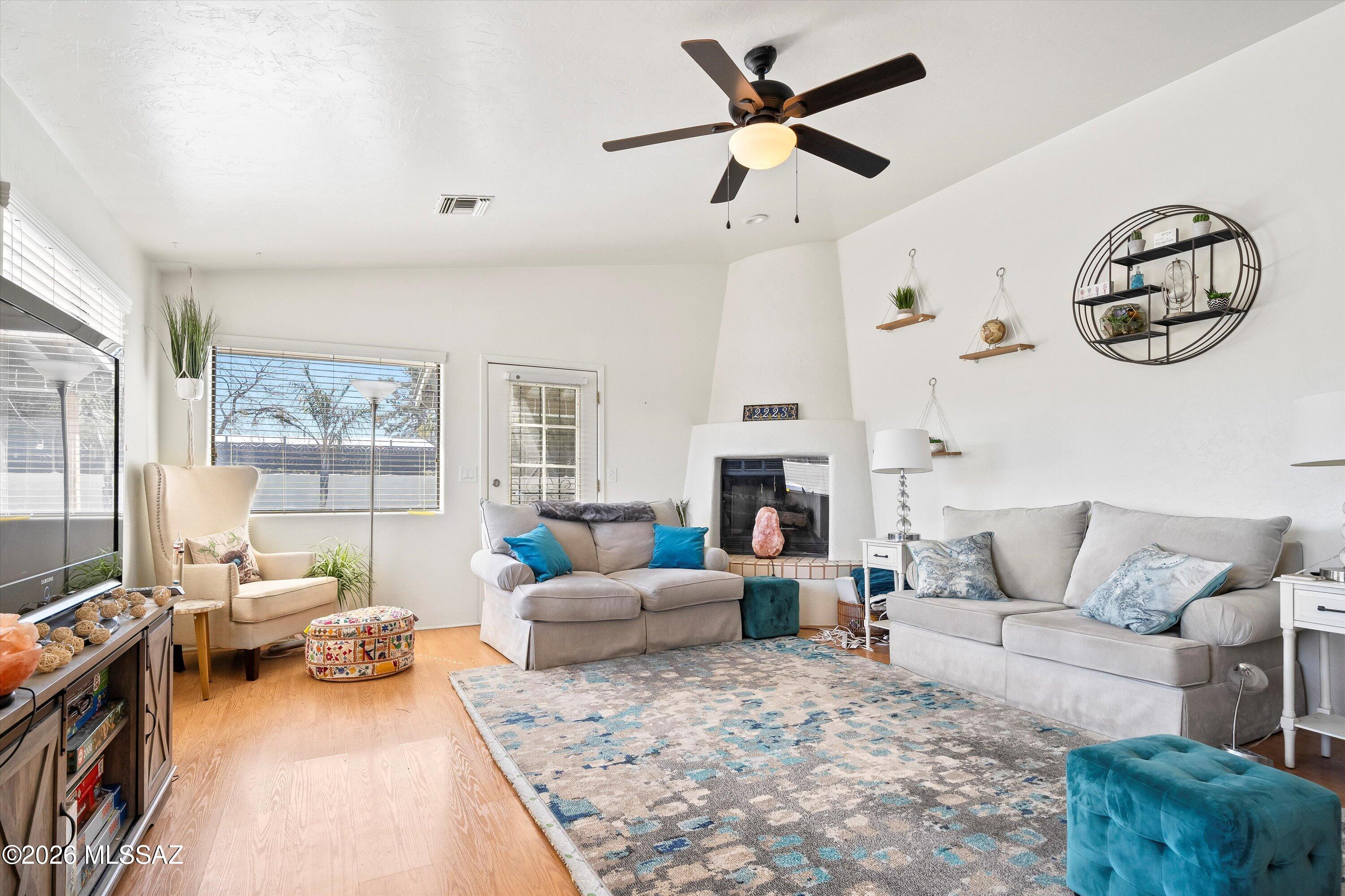 Located in the highly sought-after Blenman-Elm neighborhood, just minutes from the University of Arizona and Banner Medical Center, this versatile home combines timeless charm, thoughtful updates, and outstanding flexibility. Step into the main house and be greeted by soaring ceilings, abundant natural light, and an inviting living room. The spacious kitchen is designed for effortless entertaining, offering extensive cabinetry, generous counter space, and all appliances included. Three comfortable bedrooms and two bathrooms provide room for everyone. An attached private studio enhances the home's versatility, complete with its own sink, refrigerator, and microwave, ideal for guests, extended family, a home office, or rental income. Outside, unwind in your own desert sanctuary. Enjoy the sparkling pool, relax on the low-maintenance turf, or gather under the shaded gazebo surrounded by lush desert landscaping. A two-car parking pad and ample storage complete the package. With shopping, dining, and Tucson's vibrant urban energy just minutes away, this home offers an exceptional opportunity for comfortable living, multigenerational use, or investment potential. A true Tucson treasure, warm, welcoming, and wonderfully versatile.