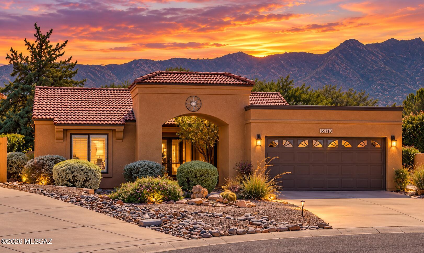 Light and bright, this beautifully updated single-story home sits in the desirable SaddleBrooke HOA 1 on a spacious cul-de-sac lot. Vaulted ceilings and large picture windows create an open, airy feel. This inviting 2-bedroom, 2-bath home features LVP flooring and a remodeled kitchen with a Samsung Bespoke refrigerator, white quartz countertops, and a glass tile backsplash. Updates include fresh interior paint (2026), quartz bathroom counters (2026), mirrors and lighting (2026), roof underlayment (2024), exterior paint (2024), epoxy garage floors (2024), water heater (2025), and windows (2025). Enjoy the peaceful backyard and covered patio with ceiling fans. Move-in ready and beautifully maintained!  Most furniture available on a separate bill of sale!