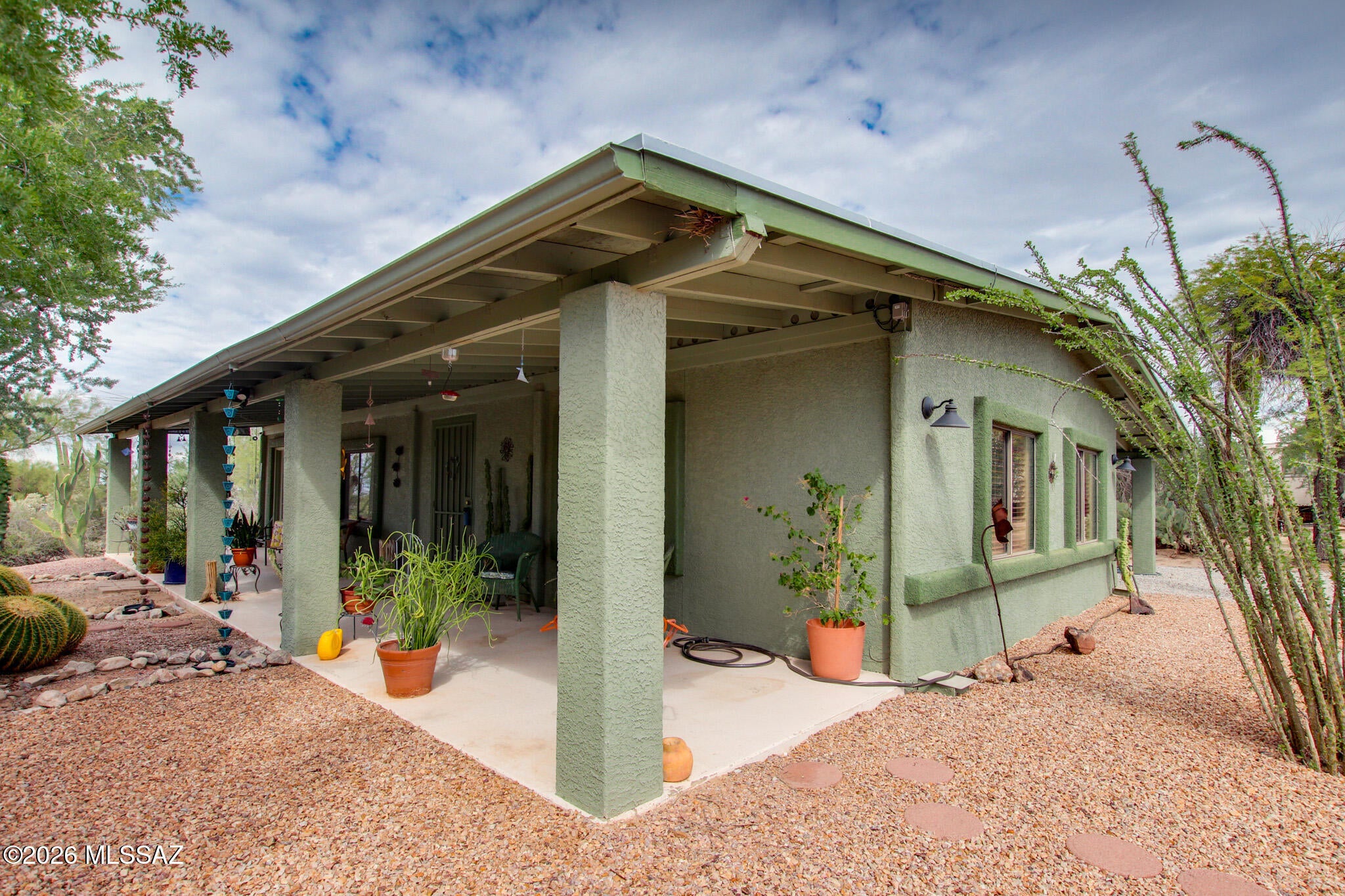 Enjoy the space and freedom of country-style living on a full acre with no HOA! This 2-bedroom, 2-bath home offers plenty of room to enjoy the outdoors while taking in beautiful Catalina and Tucson Mountain views. The spacious property provides flexibility for RVs, recreational toys, gardening, or creating your own outdoor retreat. A storage shed offers additional space for tools and equipment, while the dedicated dog run is a great added feature for pets. With an acre of land, mountain views, and no HOA restrictions, this property offers privacy, space, and plenty of possibilities.