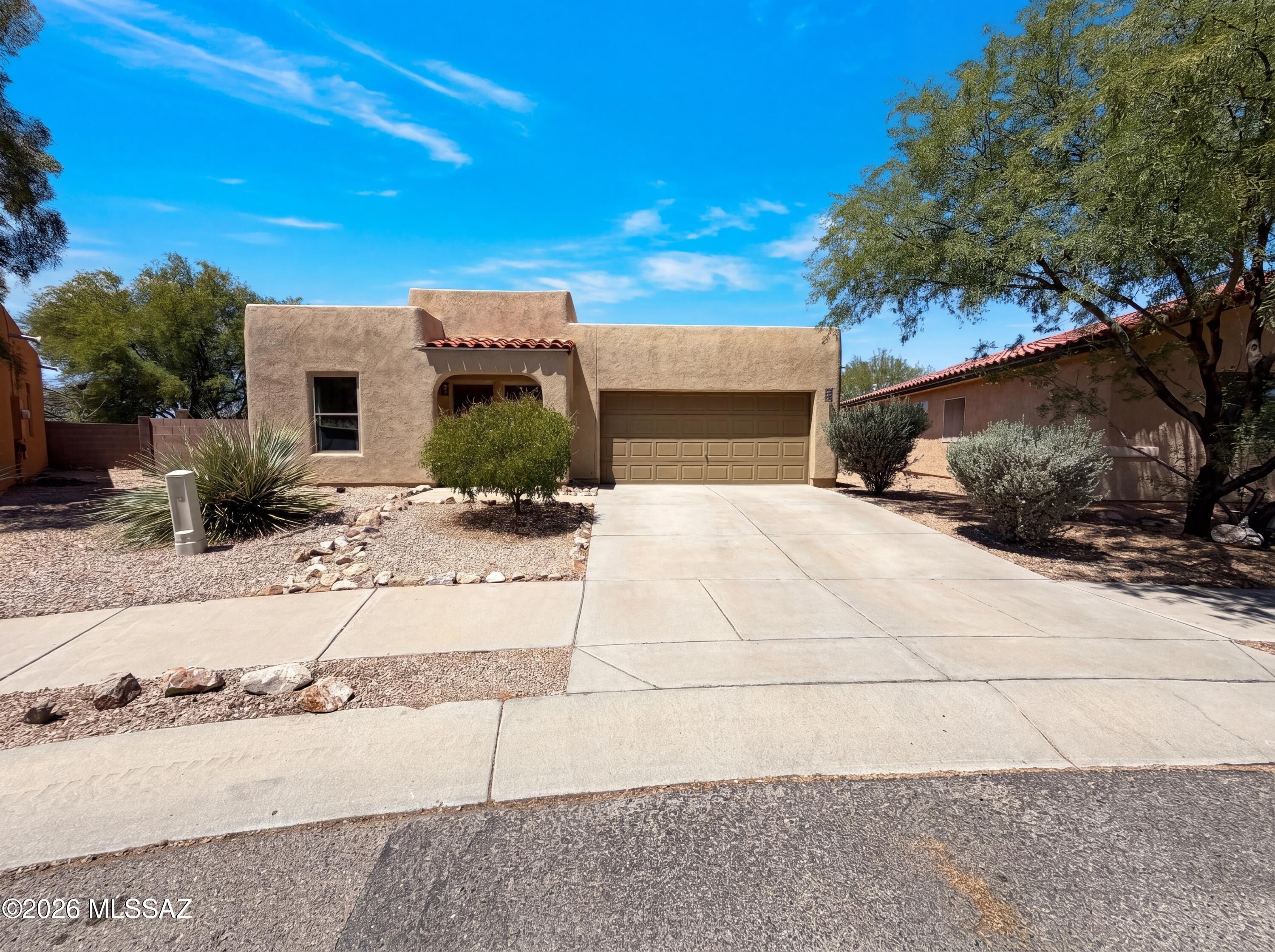 Welcome to 7102 S Vuelta De Tranquilidad, recently updated with fresh interior paint throughout. The kitchen features all stainless steel appliances and an accent backsplash for a polished look. The primary bedroom includes a walk in closet, and the primary bathroom provides double sinks. An established fenced in backyard completes the property. Come visit now! Included 100-Day Home Warranty with buyer activation