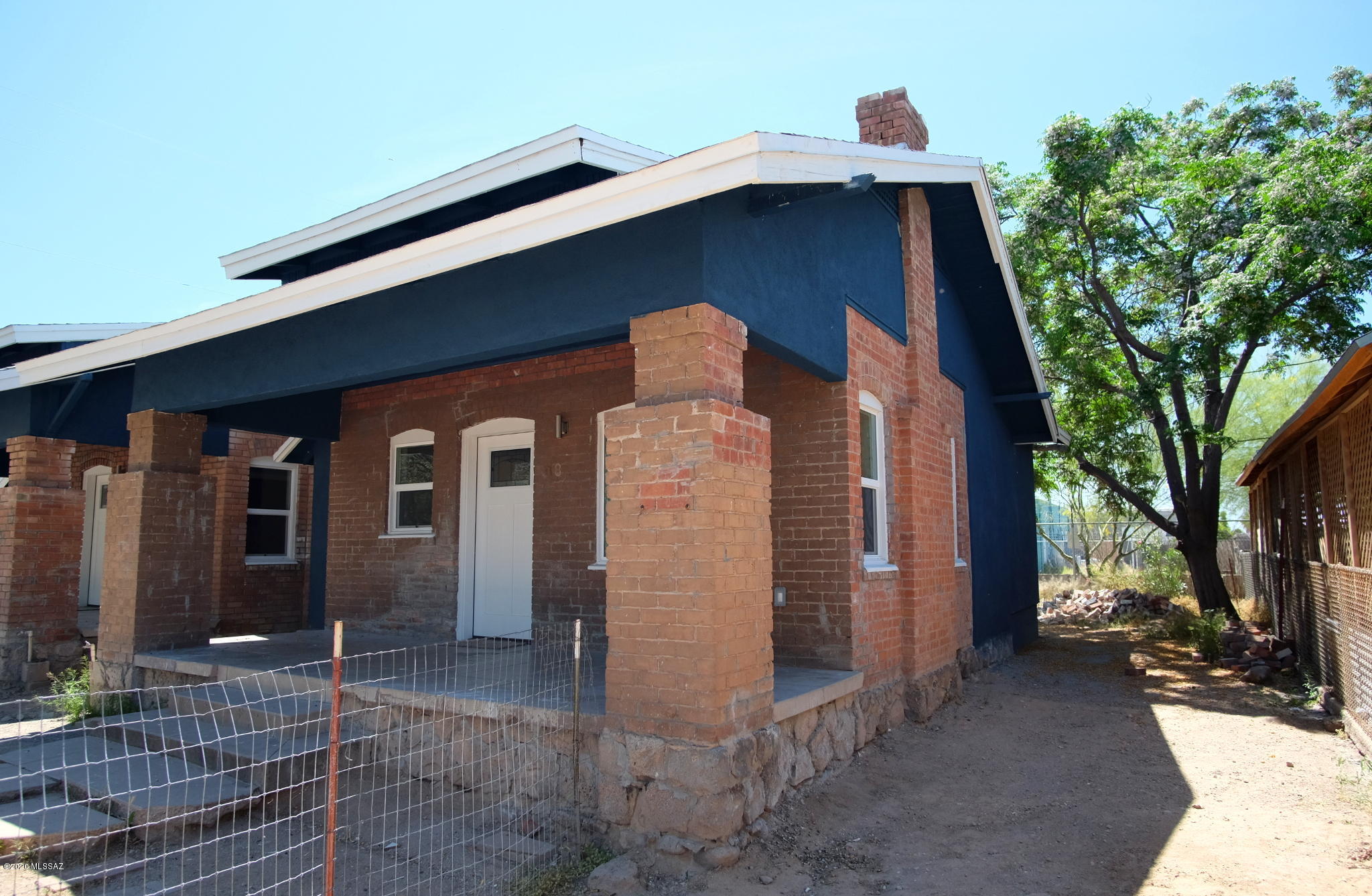 Text for a Walkthrough Video/more info. Walk or Bike Downtown from this renovated Craftsman-style 1BR/1BA unit located at the up and coming Five Points corner of Tucson, just South of Armory Park. Premium Contemporary finishes throughout the unit including; stainless appliances w/ gas range; sustainably-harvested solid wood plank flooring & contemporary hexagon ceramic tile throughout unit; high efficiency air conditioning/heat; dimensional tile & rain showerhead in shower; in-unit washer/dryer included; and energy-efficient windows & doors. Available immediately. 12mo minimum Lease. Costs incl, non-Refundable $50/adult Application, $1375 Security Deposit, $150/pet with approved pet, $250 cleaning. Water/sewer/trash included in rent. Tenant pays electric and gas.