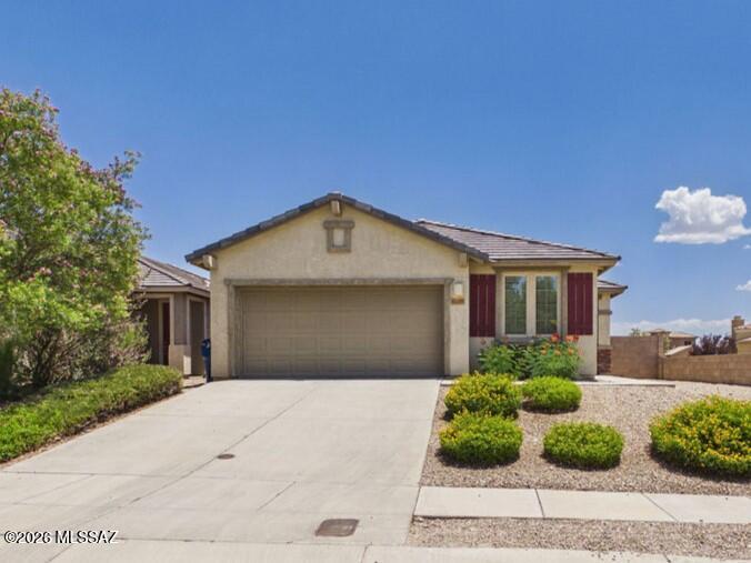 Beautiful 4-bedroom, 2-bath home with a 2-car garage and desirable split floor plan located on an elevated lot in Rancho Del Lago in Vail. This well-maintained home features a spacious layout and an incredible backyard designed for entertaining, complete with an extended covered patio and plenty of room to relax and enjoy the Arizona sunsets. Residents also enjoy access to the community pool and all the benefits of living in one of Southern Arizona's most sought-after communities. Conveniently located near top-rated schools in the highly acclaimed Vail School District, shopping, dining, and easy access to I-10.