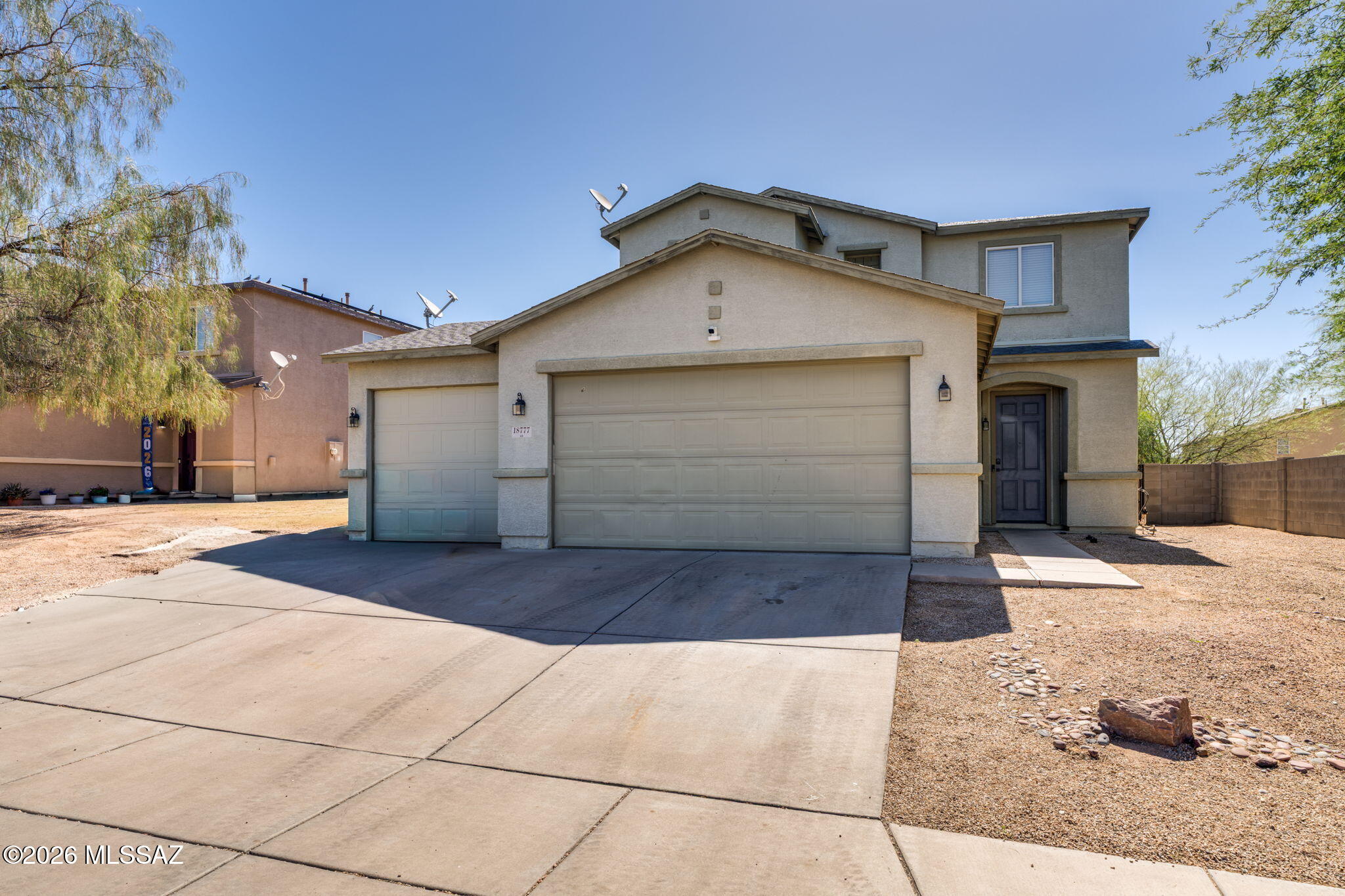 VA Assumable Loan Available at 3.625%! Upgraded 3-bedroom, 2.5-bath home with approximately 2,250 sq. ft. located in the desirable Santo Tomas Villas community in Sahuarita. Enjoy low HOA fees of just $24 per month and a thoughtfully upgraded interior designed for comfort and convenience. 

The spacious kitchen features upgraded cabinetry, stainless steel appliances, Corian countertops, backsplash, and a built-in wine bottle holder. Ceramic tile flooring runs throughout the entire first floor, while brand-new carpet extends up the staircase and throughout the second level. Additional interior highlights include ceiling fans, faux wood blinds, updated door hardware, smart thermostat, and dual sinks in both the primary and hall bathrooms. Upstairs, a large loft provides flexible space for a home office, media room, playroom, or additional living area. The refrigerator, washer, and dryer are all included, making this home move-in ready. 

Outside, you'll find a 3-car garage with 8-foot doors, a newer MyQ garage door opener, freshly painted garage flooring, and a soft water loop already installed. The backyard is ideal for relaxing or entertaining, featuring an extended covered patio, additional paver patio space, and a storage shed. Enjoy beautiful mountain views from the primary bedroom window. 

This home offers an exceptional combination of space, upgrades, and value--plus the rare opportunity to assume a VA loan at an attractive 3.625% interest rate.
