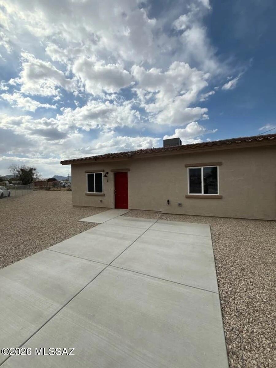 Step into this brand-new 750 sq. ft. two-bedroom, one-bathroom duplex in the heart of West Tucson. Thoughtfully designed for modern living, this newly constructed home offers a perfect blend of style, comfort, and functionality.

Inside, you'll find sleek tile flooring throughout, ceiling fans, and well-sized bedroom closets that provide practical storage. The modern kitchen is fully equipped with a refrigerator, dishwasher, microwave, and oven, making everyday cooking and entertaining simple and convenient.

The bright, open living area creates a welcoming space to relax or gather with friends, while electric heating and air conditioning keep the home comfortable year-round.

This pet-friendly home welcomes both dogs and cats, making it easy to bring your furry companions along. The unit includes one dedicated parking space, with additional street parking available for guests.

Located in a convenient West Tucson neighborhood, this newly built duplex offers easy access to shopping, dining, parks, and local attractions, making it a great choice for anyone seeking modern, comfortable living with quick access to everything Tucson has to offer.
