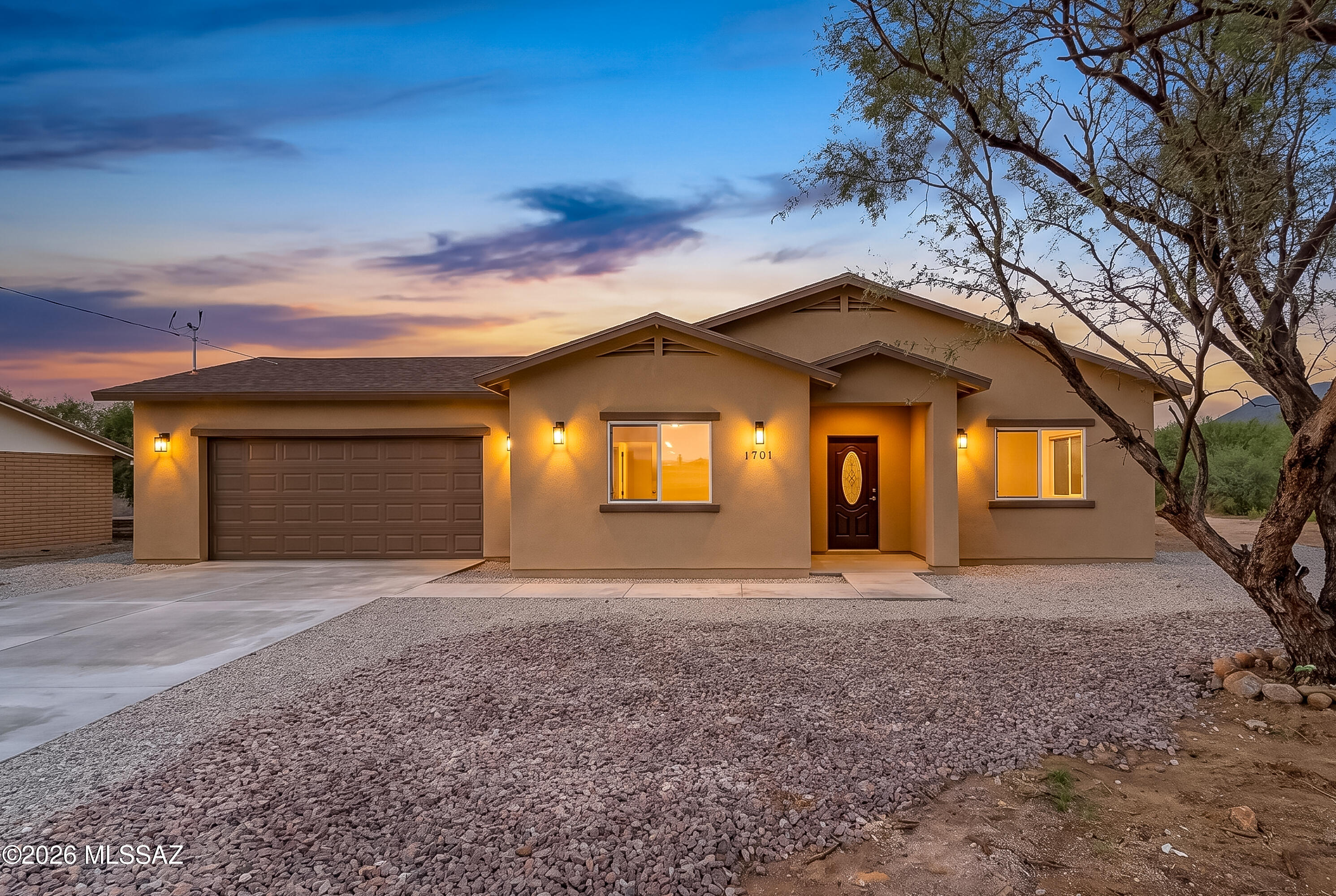 Discover modern comfort and thoughtful design in this beautifully crafted 1,650-square-foot new construction home. Ideally situated on a desirable corner lot, this home offers exceptional curb appeal, an open and inviting layout, and quality finishes throughout. The hand-crafted kitchen features stylish cabinetry, ample space, and a functional design perfect for everyday living and entertaining. An extended garage provides plenty of room for vehicles, recreational equipment, and additional storage. With abundant storage throughout the home, organization is effortless. Conveniently located with easy access to I-19, this home offers both comfort and convenience for commuting, shopping, dining, and recreation.