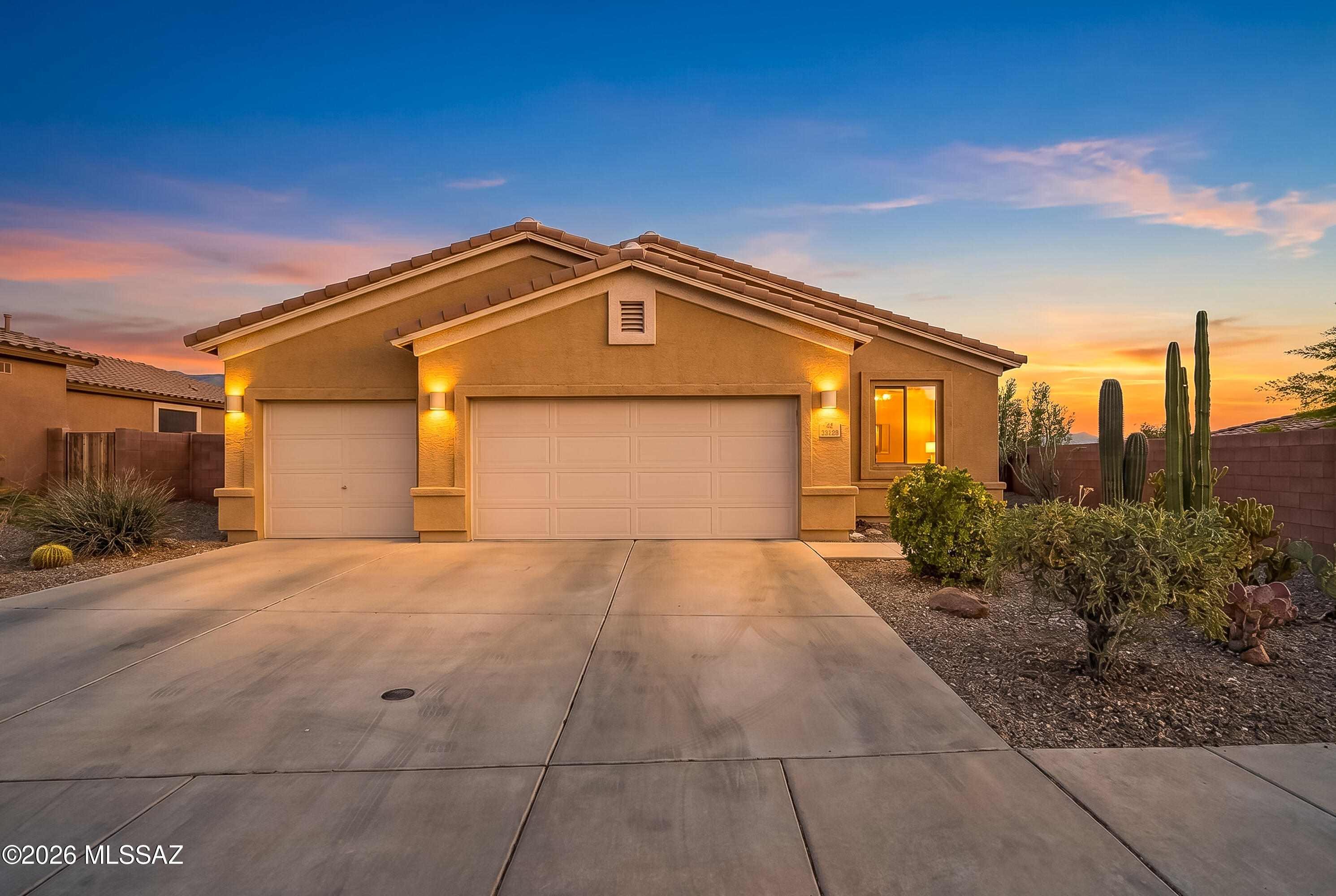 Stunning Catalina Mountain Views, great Eagle Crest Ranch neighborhood with a playground and community events, and close to Oracle and Catalina State Parks. This 1-story, 3 bedroom + den, 2 bath home has a spacious backyard with covered patio, pavers, pre-wired for a hot tub, and was professionally landscaped in 2024. The 3-car garage has overhead storage, a water filtration system, and the garage door opener was replaced in 2024. It gets better, new kitchen appliances in 2025: LG range, refrigerator, dishwasher, microwave, and washer. Also in 2025, the house was painted, solar screens installed and a new HVAC seer2, 14.3. Come to Eagle Crest Ranch and take a look!