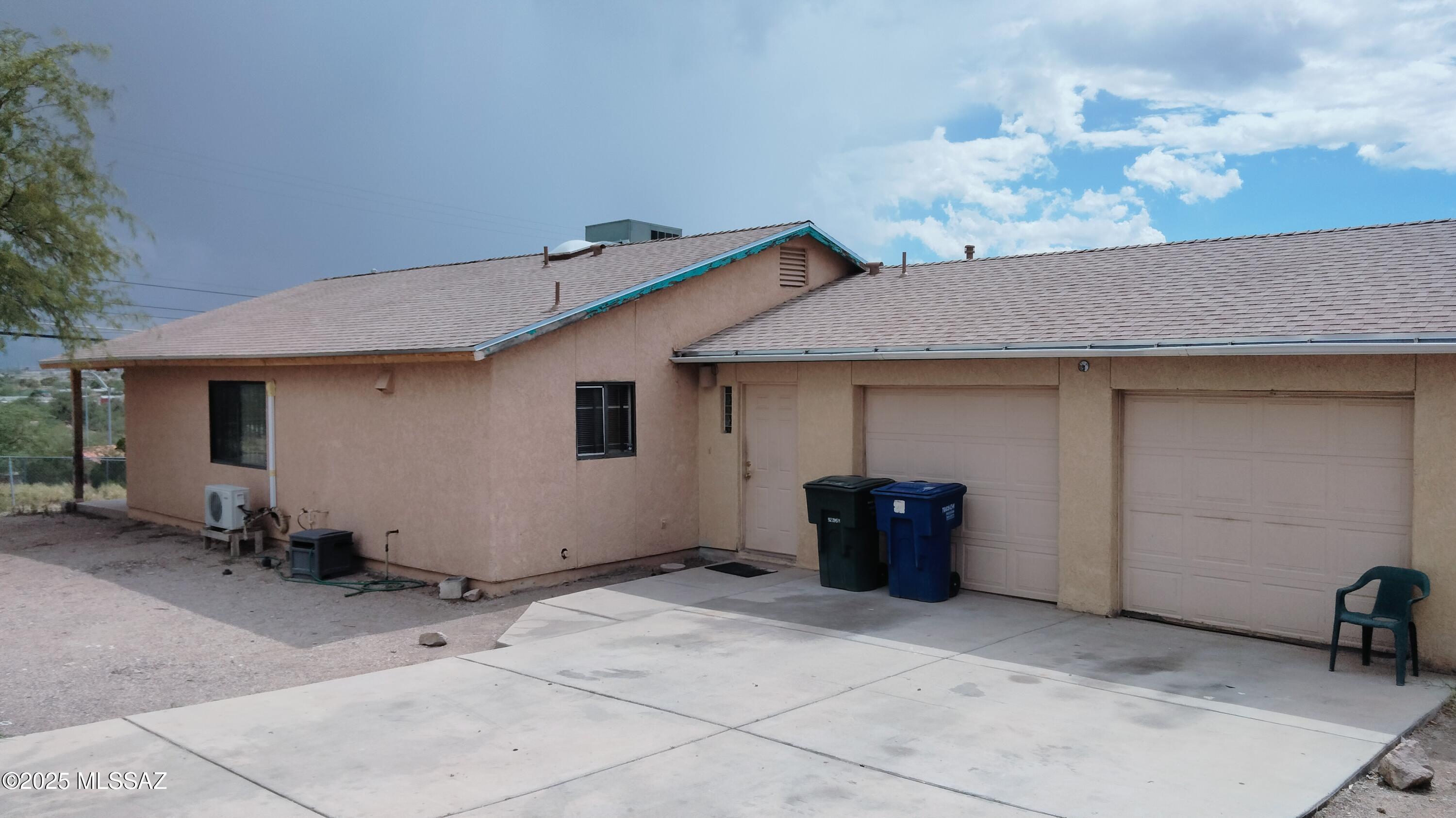 A diamond in the rough. This Corner lot property has some great potential. Newer roof, super-sized garage for hobby buff.  Sits near the base of A-Mountain and has great Fourth of July views !!!