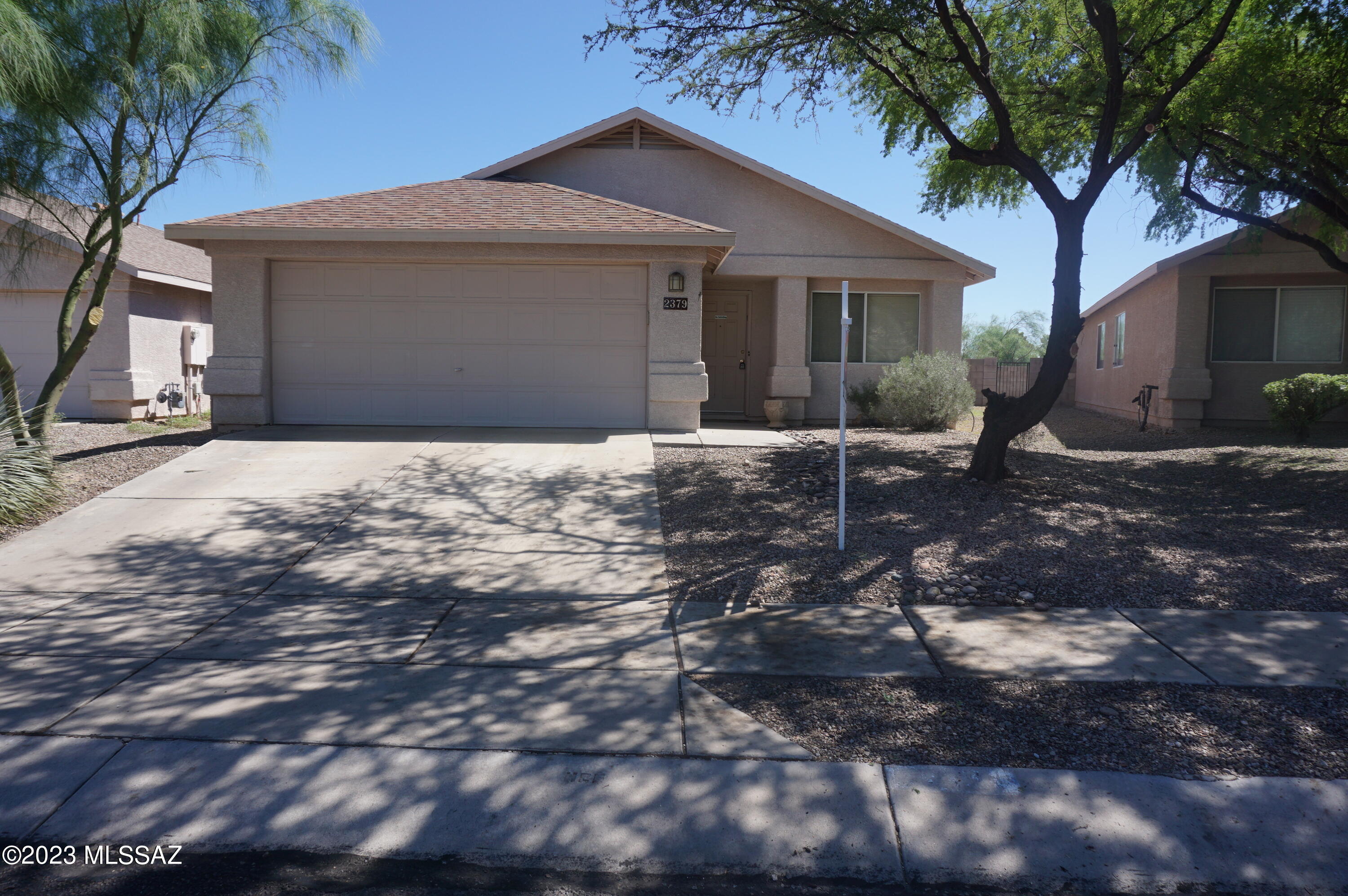 Great 4Bdm 2Ba single story home near U of A, Open Kitchen with Open living, dining and family room, Kitchen features all newer stainless steel appliances including side-by-side refrigerator and gas range, eat at breakfast bar and pantry. Custom built-in's in family room with fireplace. Vaulted ceilings, ceiling fans, LARGE walk-in closet in master bedroom and vanity desk in master bath, Large lot backing to open space with a view, small dogs welcome, Carpet only in the bedrooms. Large backyard, covered patio, extended pavers and grass that is always green!
Must See!