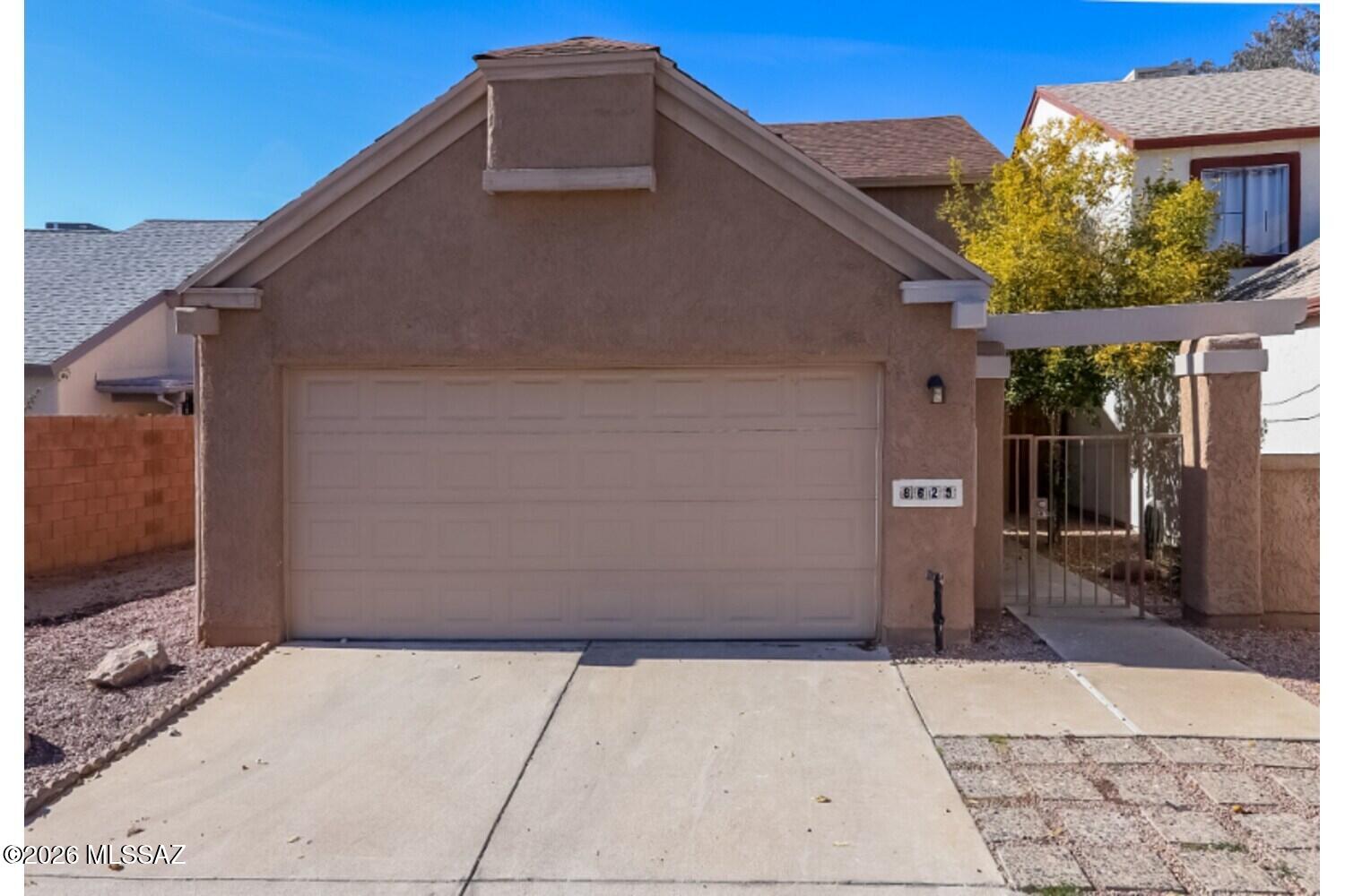 Discover the perfect blend of comfort and convenience at 8629 West Katapa Trail, Tucson, AZ 85742! This inviting 3-bedroom, 2-bathroom home offers 1,288 sq. ft. of thoughtfully designed living space with an open-concept layout ideal for everyday living and entertaining. The kitchen features ample storage and workspace, while spacious living and dining areas create a warm atmosphere. The primary bedroom includes an en-suite bath, and additional bedrooms are perfect for family, guests, or a home office. Enjoy a low-maintenance lifestyle near schools, parks, shopping, dining, and commuter routes. Schedule your showing today!