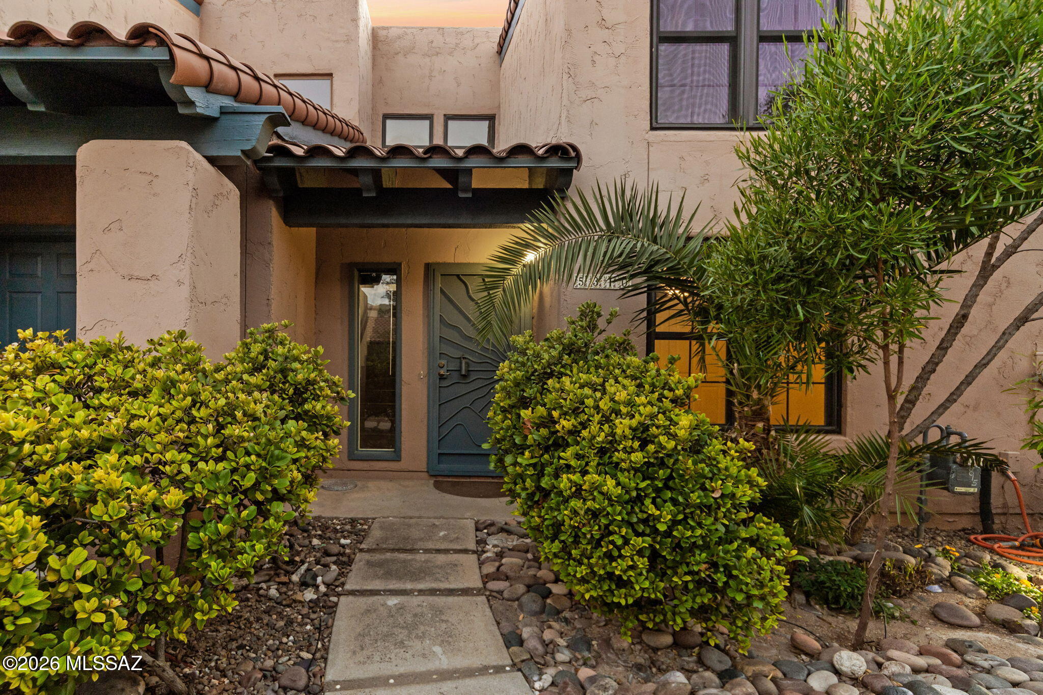 Just moments from Sabino Canyon, this beautifully cared-for townhome offers a serene desert retreat within an established community known for its mature landscaping and park-like grounds! Facing open desert, the home enjoys a peaceful outlook that makes its setting especially appealing!
Fresh interior paint and refreshed flooring complement soaring ceilings, abundant natural light, and inviting living spaces. A striking fireplace anchors the living room, while an arched window and warm tile floors add architectural character. The kitchen features white cabinetry, quartz counter tops, stainless-and steel appliances! A versatile upstairs loft provides space for an office, reading nook, or additional sitting area. A sheltered patio invites quiet mornings and relaxed evenings surrounded by th natural beauty of the open desert!
Included community amenities, (clubhouse, fitness center, and pool area) enhance the lifestyle, with Sabino Canyon's trails and outdoor recreation just minutes away. Reflecting high pride of ownership, this thoughtfully refreshed townhome is a special opportunity to enjoy comfort, character, and an exceptional location in one beautifully peaceful setting!