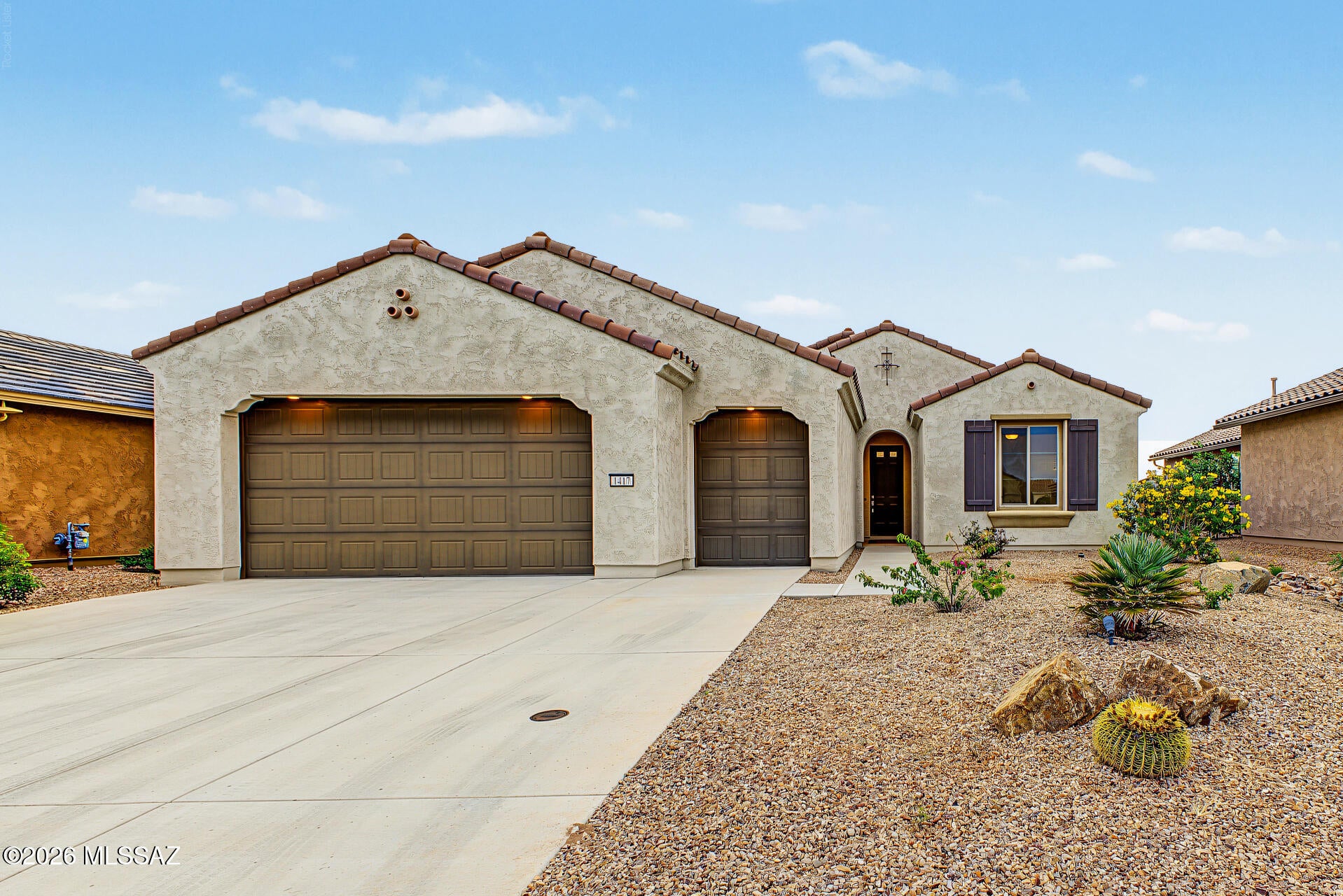 Greenbelt living and effortless Arizona style come together in this beautifully maintained popular model. This home offers separate living areas plus a versatile den, with an open layout designed for entertaining. The spacious kitchen features a gas range, stainless appliances, generous quartz island and abundant counter space for all to be together. Step outside to an extended custom-paver patio overlooking the lush green area - perfect for morning coffee, entertaining or relaxing under the Arizona sky. Low-care landscaping means more time to enjoy the lifestyle. The 2.5-car garage offers room for a golf cart, workshop or extra storage. Enjoy Quail Creek's exceptional 55+ amenities, including golf, tennis, pools, fitness, clubs and pickleball plus walking distance to Canyon Club!
