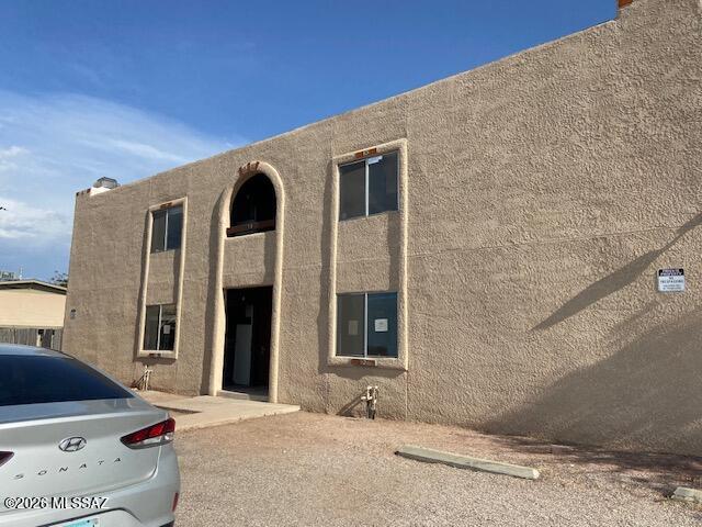 4 plex with all units 2 beds and 1 bath.  Located on Tucson bike path route.  Centrally located near University of Arizona, Davis Monthan and hospitals.  Four onsite parking spaces.  Two units have sliding patio door to yard.  One unit has a storage shed.  Two upstairs units have a fireplace.  One unit needs finish of remodel.  This is a fix up property but potential value here, take a look.