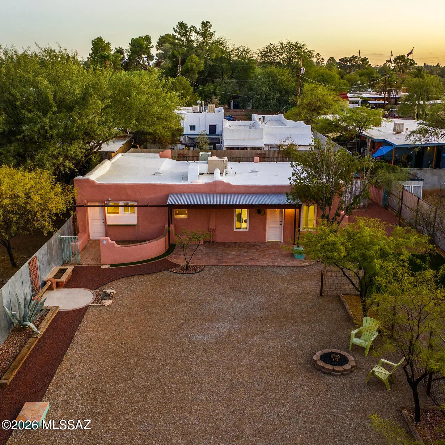 Unique historic adobe home in the heart of Central Tucson! This spacious 5-bedroom, 2-bath home offers approximately 1,654 sq. ft. with a flexible floor plan and plenty of character. A second kitchen like area provides additional convenience and versatility. The large yard offers privacy and abundant outdoor living space with multiple entertaining areas, BBQ spaces, fire pits and an outdoor fireplace. Ample off-street parking adds to the convenience. Ideally located near the University of Arizona, 4th Avenue, downtown, restaurants, shopping, parks and hiking trails. washer, dryer and second fridge not shown in pictures. PETS UPON APPROVAL. Krasnick Realty represents landlord only on this listing.