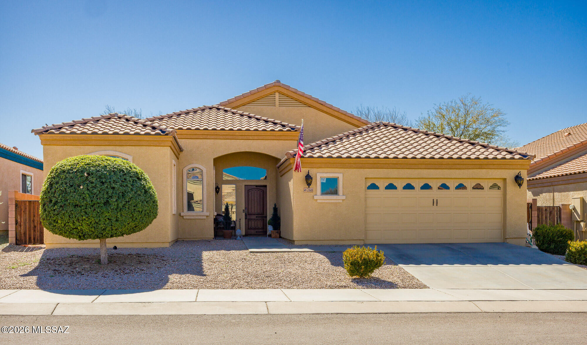 Welcome home! Walk into the spacious foyer and be wowed by the comfortable, homey feel of this fantastic 1955 sqft home on a large beautifully landscaped lot. This gorgeous home has been beautifully updated and well-maintained: new HVAC 8/2024, water heater 10/2025, & exterior paint 9/2023. Upgraded kitchen, lighting, blinds, toilets, and flooring throughout. Open & split floorplan, ceiling fans, and huge laundry/utility room. 2.5 car garage has lots of extra space for storage or workshop space. Full length partially covered back patio extends out to large landscaped backyard with trees, irrigation, & plenty of room for a pool. Sycamore Park community has multiple parks, athletic facilities, and walking trails. Located in the award-winning Vail School District!