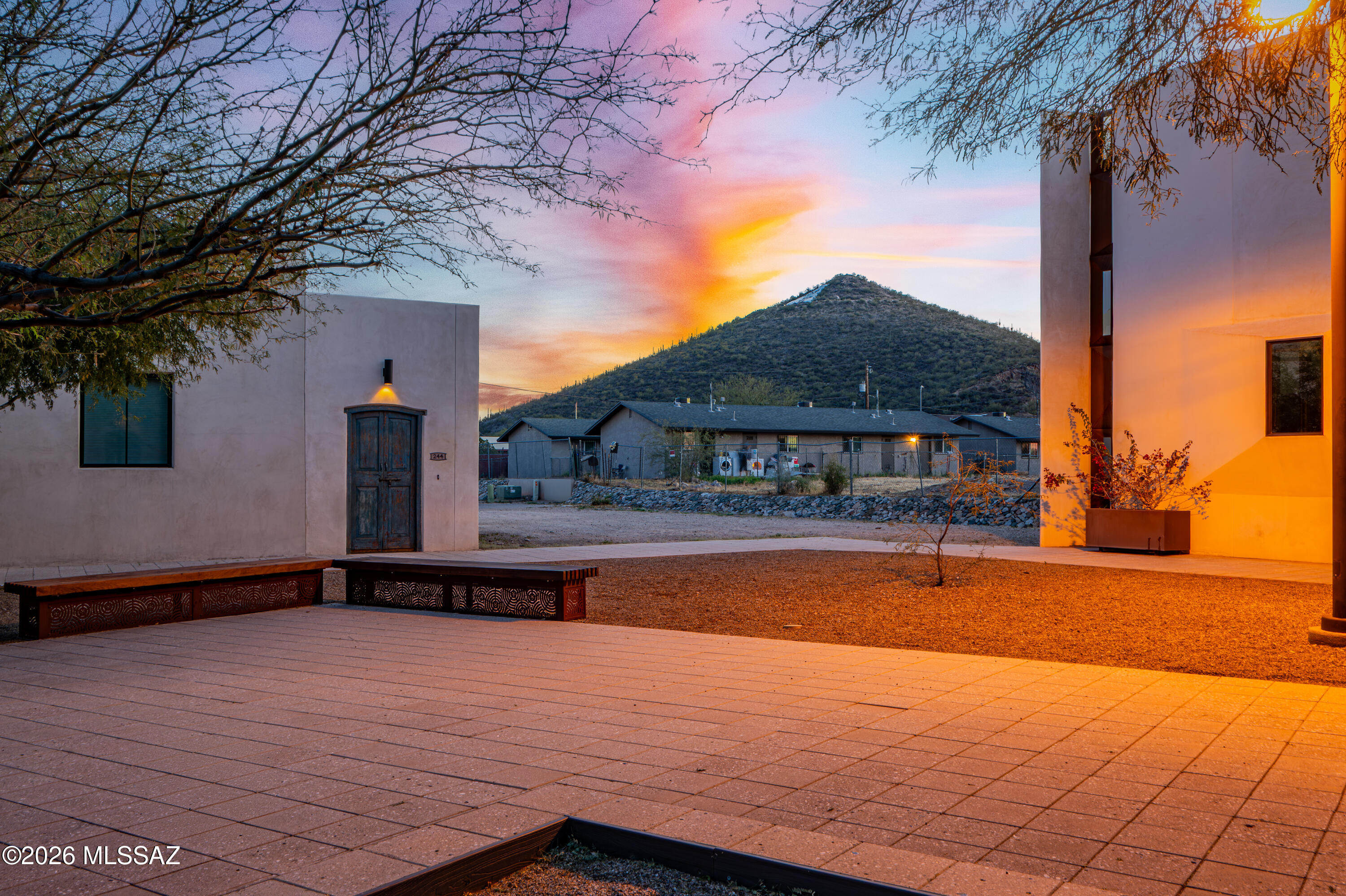Rare opportunity to secure this large 0.109-acre corner homesite on the coveted West Plaza in Tucson's sought-after Mercado District. Surrounded by beautifully crafted masonry residences, this parcel offers an exceptional setting to design and build a custom home in one of the city's most distinctive urban neighborhoods.
Architectural plans are available for purchase, designed by acclaimed architect Michael Franks of Seaver Franks. The thoughtfully conceived design frames views of the plaza, while an upper-level deck captures sweeping vistas toward A Mountain.
The Mercado District is celebrated for its walkable design and strong sense of community, with pedestrian-friendly streets, inviting neighborhood gathering spaces, and a vibrant local culture. From this location, enjoy convenient access to the Streetcar, providing an easy connection to downtown and the University of Arizona.
Nearby destinations include Mercado San Agustín, MSA Annex, and The Monier.
Build your vision in a neighborhood defined by architecture, culture, and connection.