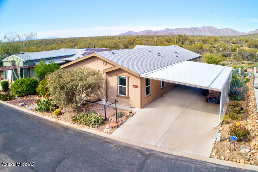 This is your chance to own a home on the north facing perimeter of the community which backs up to BLM land!  Newer 2018 3 bedroom 2 bath 1680 square foot home will be affixed at closing. Open living room, dining, and kitchen plan at the rear of the home where you can enjoy all of the views. Deck and gazebo added to rear of home to enjoy the wildlife that passes by. One of the guest bedrooms includes a Murphy bed. Concrete double driveway
Located in Copper Crest, a gated Active Adult Community, residents enjoy resort-style amenities including swimming pool, spa, shuffleboard, pool table, fitness center, hiking and biking trails, and more--all just a short drive from Tucson.