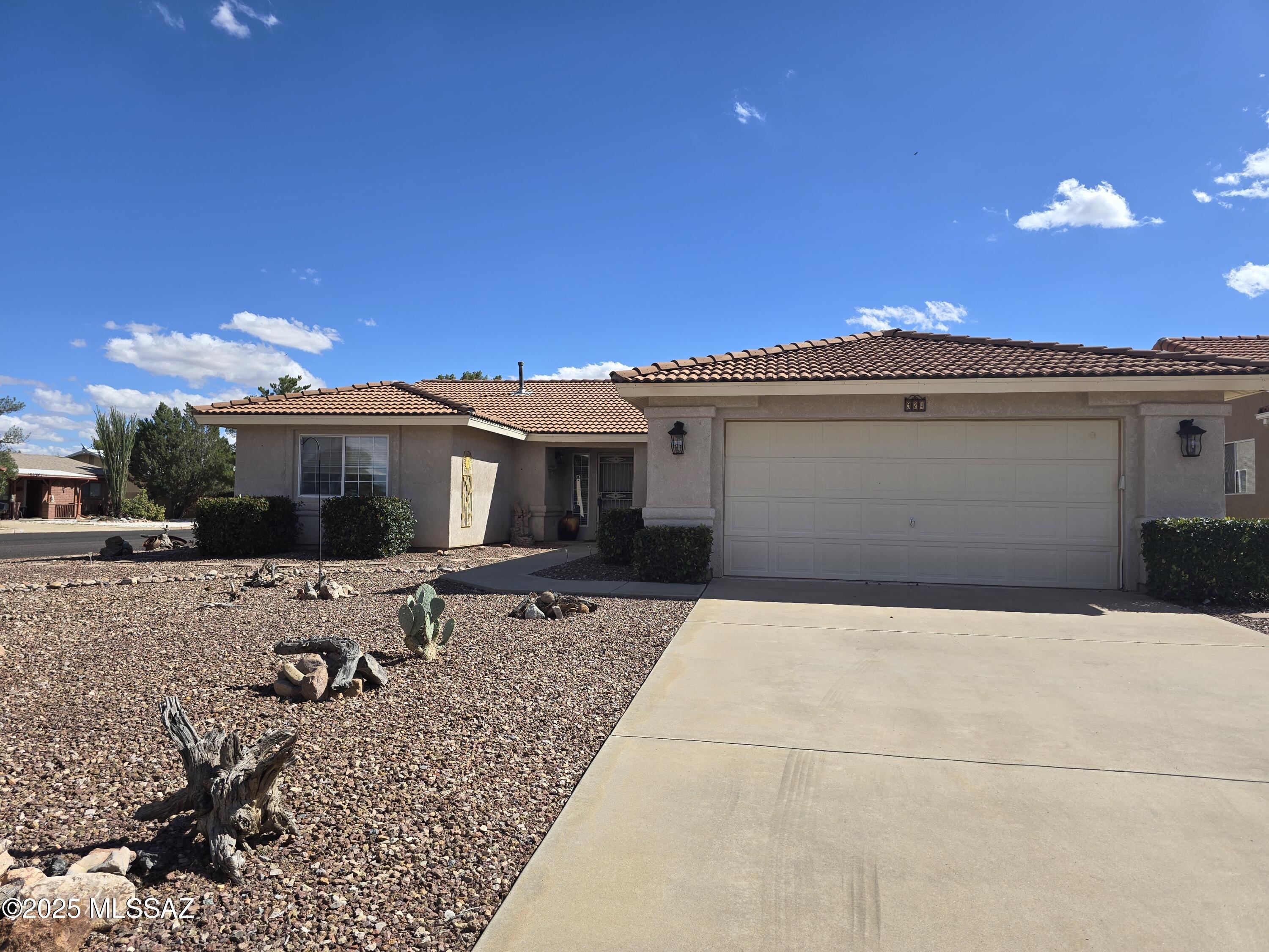 SHORT SALE.  lender process has started.Great corner lot with border to just one home! Back yard borders local vineyard! Over 1800 sq ft home with greatoom concept, off kitchen with breakfast bar/formal dining area. Bold kitchen offers gas range, refrigerator, walk-in pantry (and more storage in laundry room!). And there's a utility sink in laundry! Primary bedroom has patio access, ceiling fan, dual sink vanity, walk-in shower and walk-in closet. Hall/guest bath has tub/shower, and front bedroom has 3 sliding door closet - lots of room! Room off entry is used as office, but could be 3rd bed, with walk-in closet. Garage has shelving that stays, and side yard access door. Enjoy your new home with the newer HVAC!