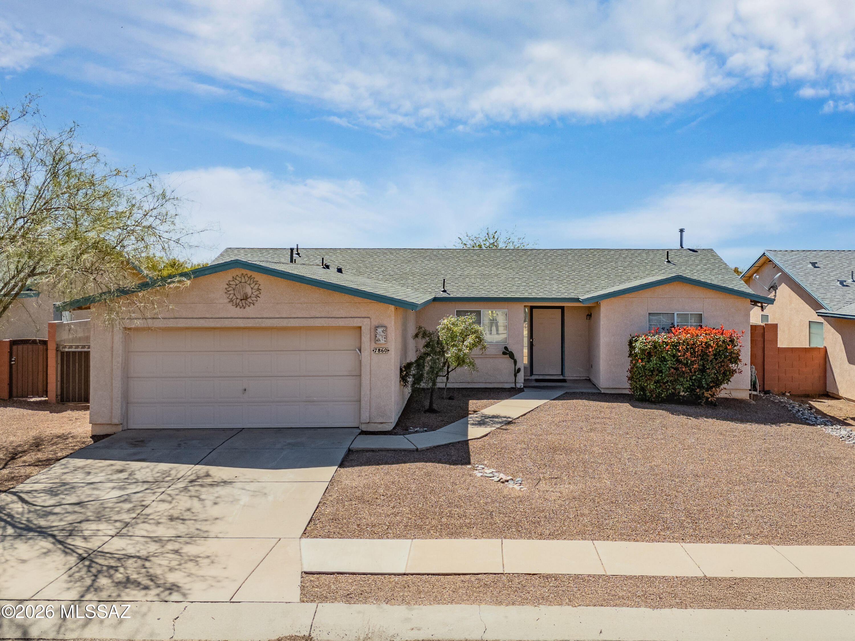 Welcome to this desirable Rita Ranch neighborhood featuring a 3 bedrooms, 2 bath home with a split bedroom floor plan and a spacious functional layout. This purposefully updated home has significant investments including a NEW ROOF with a transferable roof warranty (2024), FULLY REPLUMBED in 2023 (no poly pipes), and newer HVAC (2018). The fully remodeled (2026) primary bath features a brand new custom tiled walk-in rain shower, new double sink vanity, color changing lights, Bluetooth speaker and exhaust fan system. Enjoy real grass in the backyard with a large covered flagstone patio and extended height walls to add privacy. Ideally located less than 5 minutes from the freeway with quick access to shopping, dining and everyday conveniences. A fantastic opportunity for comfortable living.