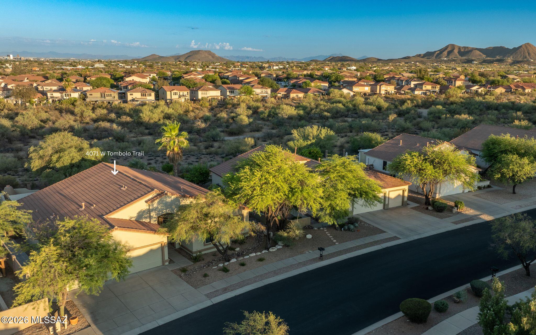 PRICED FOR IMMEDIATE ACTION! Unpack your bags and step into instant equity! Nestled behind the secure gates of the highly desirable Agua Dulce community, this pristine 2,374 sq. ft. contemporary haven offers an incredible, value-packed opportunity under the Tucson Mountain foothills. From the soaring ceilings to the open-concept floor plan, every inch of this home maximizes comfort and modern desert living. 

Framed by the majestic Tucson Mountains, this gated sanctuary features a custom-built backyard pavilion designed for golden hour relaxation.