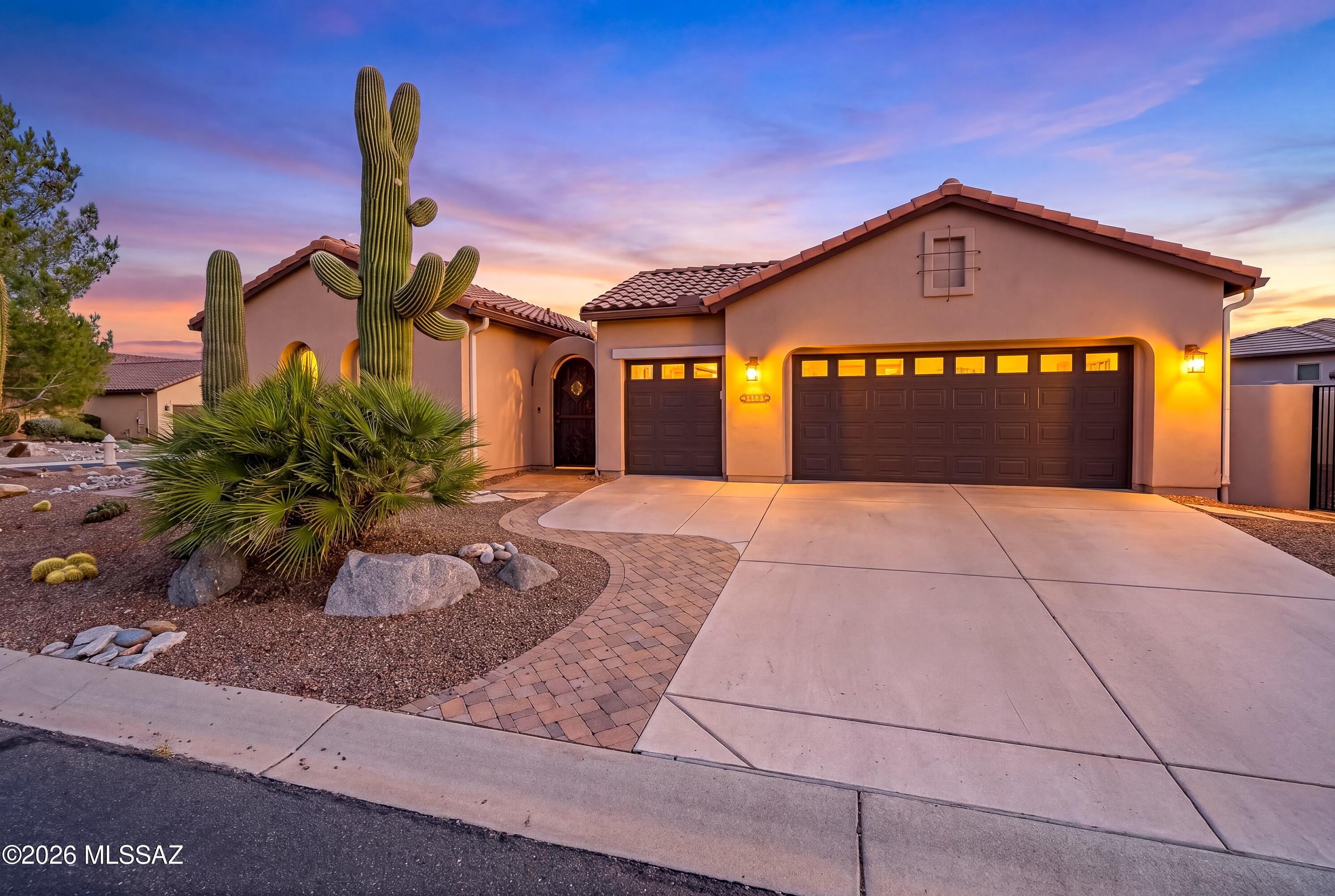 Mirasol with private casita, pool and mountain views in SaddleBrooke Ranch! Ideally located close to the community's exceptional amenities, this beautifully customized home offers an inviting combination of indoor comfort, private guest accommodations and resort-style outdoor living.  Adding to the home's distinctive curb appeal is an extraordinary bifurcated saguaro--a rare and striking desert specimen that creates an unforgettable welcome.

A custom gate opens to a peaceful courtyard and welcomes you into a thoughtfully appointed interior featuring crown molding, shutters, tile flooring throughout the main living areas, as well as new LVP in bedrooms and casita. The spacious great room is highlighted by an artfully designed entertainment wall with lighted niches and beautiful mountain views.

Designed for entertaining, the kitchen features granite countertops and backsplash, stainless-steel appliances and a gas cooktop. A separate party bar with granite surfaces, sink and additional beverage refrigeration provides another great space for gathering with family and friends.

The primary suite is a relaxing retreat with a bay window and direct access to the pool and patio. The remodeled primary bath features a tiled walk-in shower, quartz countertop and vessel sinks. The casita provides comfortable, separate accommodations for overnight guests.

Outside, enjoy your own Arizona retreat with a saltwater Pebble Tec self-cleaning pool, mountain views and mature desert landscaping. A built-in gas barbecue and counter make outdoor entertaining easy, creating the perfect setting for morning coffee, afternoons by the pool or evenings with friends.

Recent updates include the HVAC system, irrigation, interior and exterior paint, refrigerator and microwave, as well as a pool light and garage-door springs and cables. Additional features include a Kinetico reverse-osmosis and water filtration, whole-house gutters and downspouts, and a 220V breaker.

With a desirable updated Mirasol floor plan, private casita, resort-style pool, mountain views and convenient location near SaddleBrooke Ranch amenities, this exceptional home offers everything you need to enjoy the SaddleBrooke Ranch lifestyle.