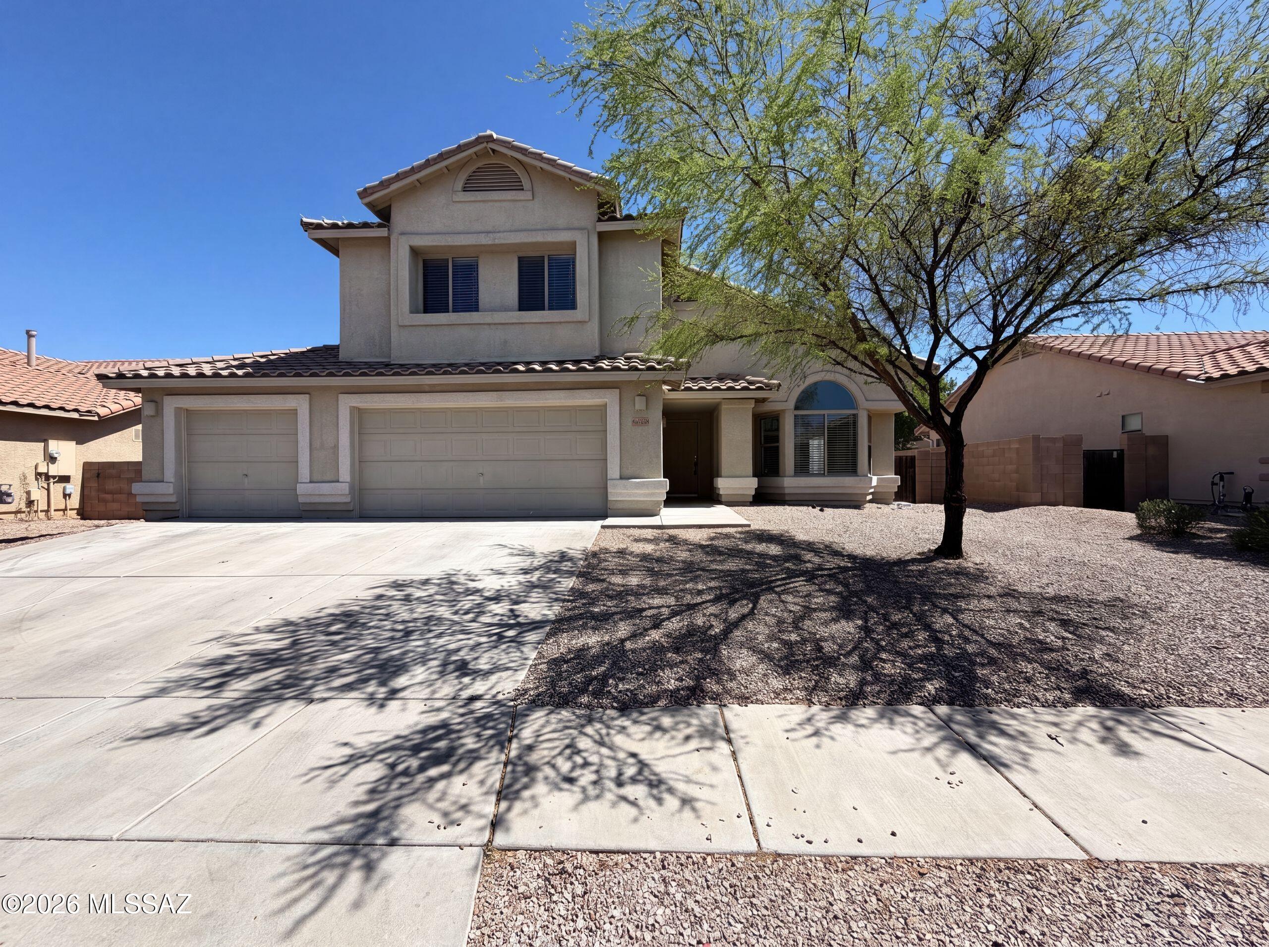 Meet 6503 W Misty Mountain Way, recently refreshed with new flooring throughout the home and fresh interior paint, enhancing its move-in readiness. The kitchen provides great cabinet storage and ample counter space, complementing the primary bathroom's separate tub and shower. The exterior includes a covered patio leading to a fully fenced in backyard. This updated home provides comfort and functionality, ready for everyday living.. Included 100-Day Home Warranty with buyer activation
